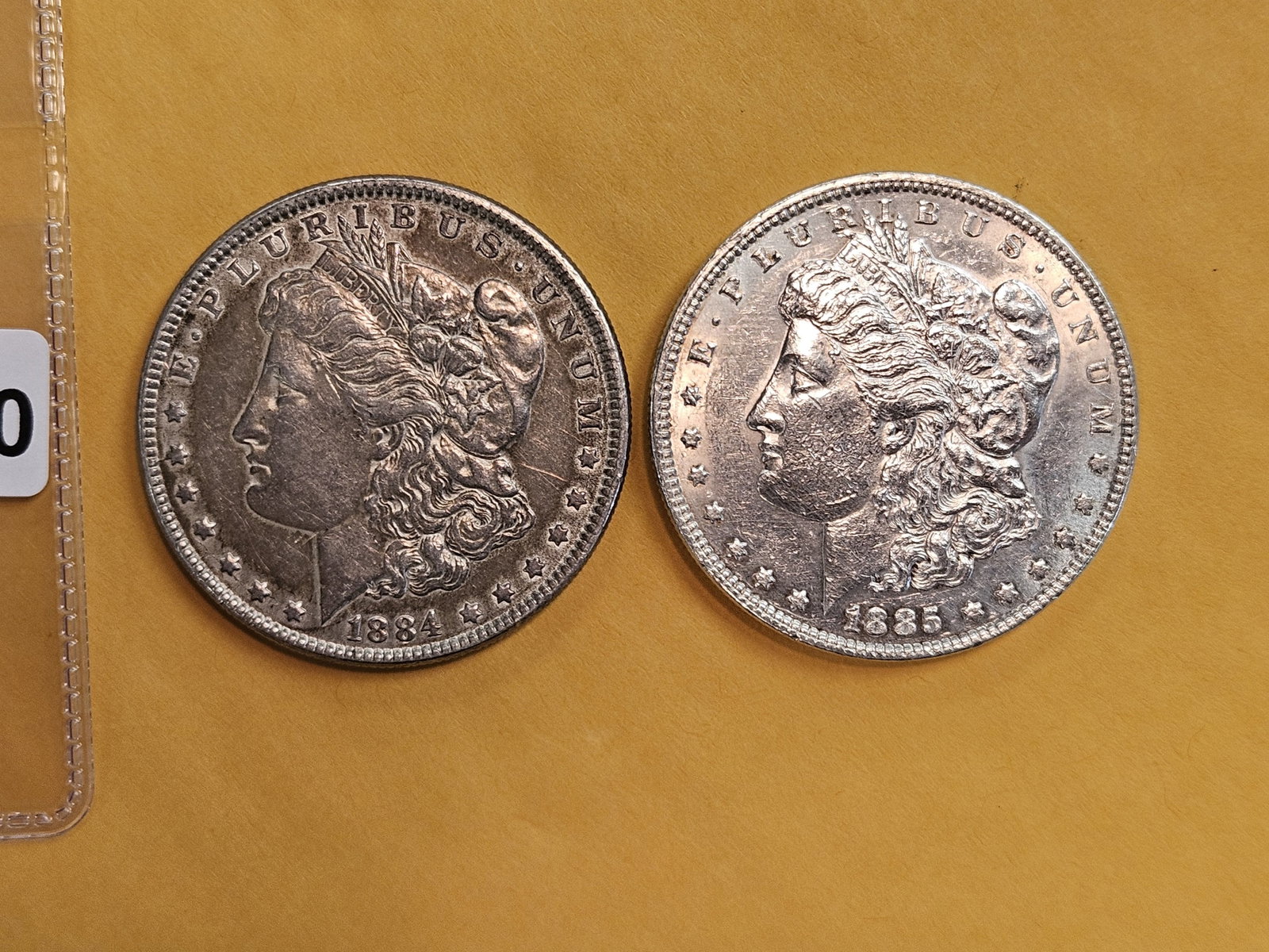 Two Brilliant About Uncirculated Morgan silver Dollars: Mixed