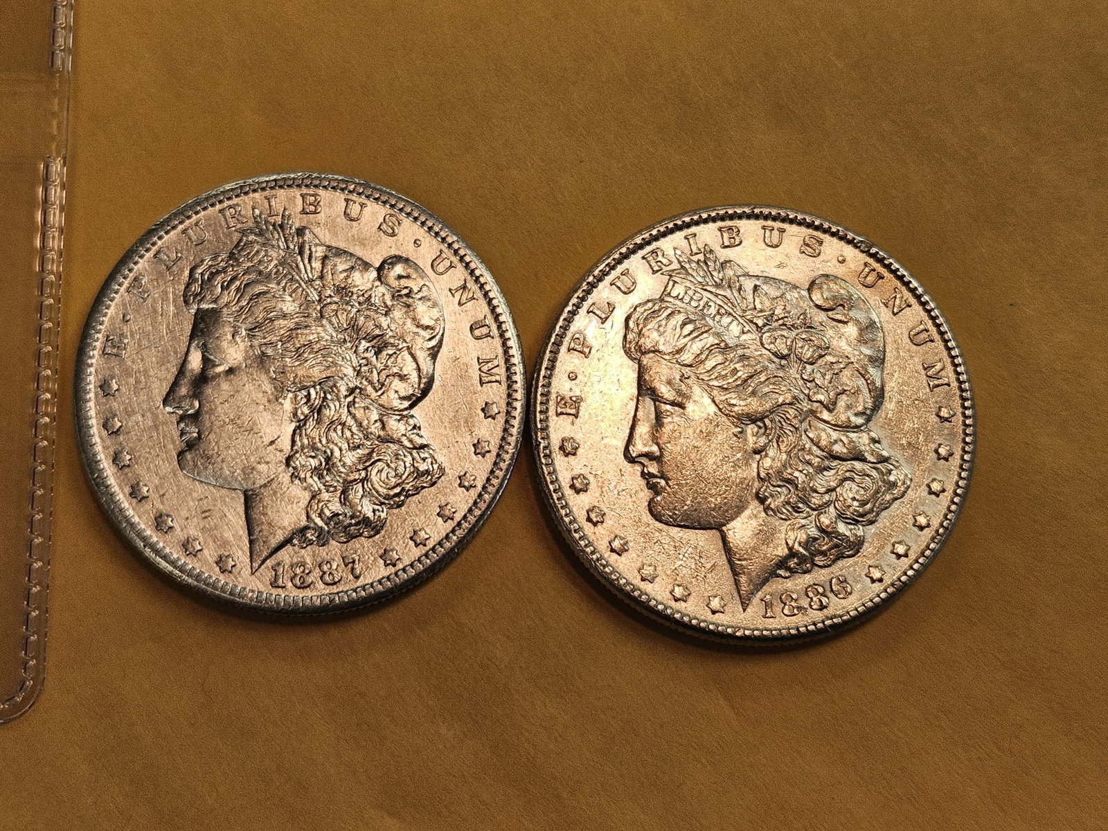 Two Brilliant About Uncirculated Morgan silver Dollars: Mixed