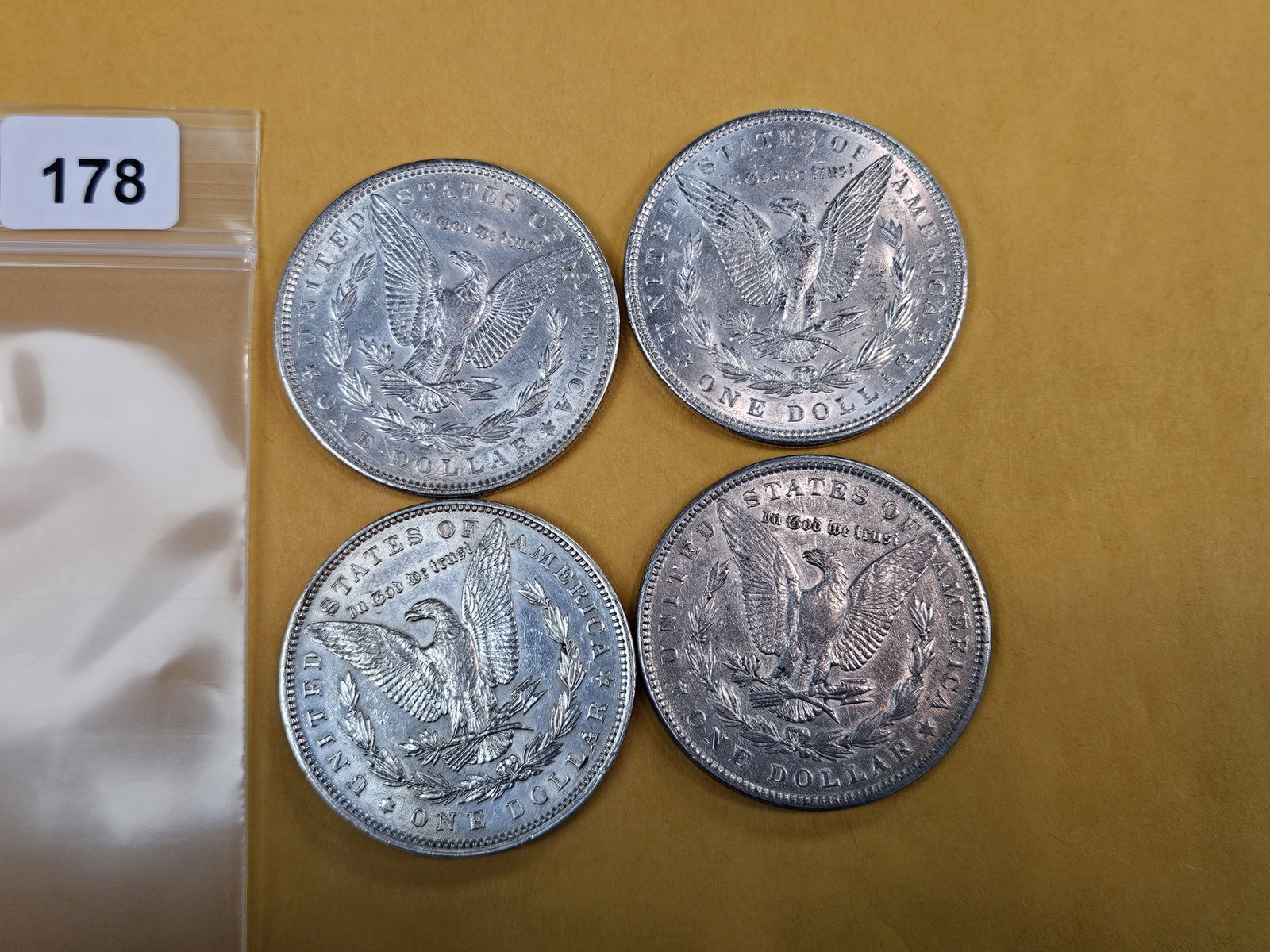 Four mixed About Uncirculated Morgan Silver Dollars - 3