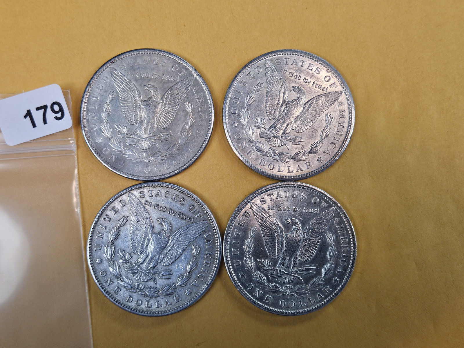 Four mixed About Uncirculated Morgan Silver Dollars - 3
