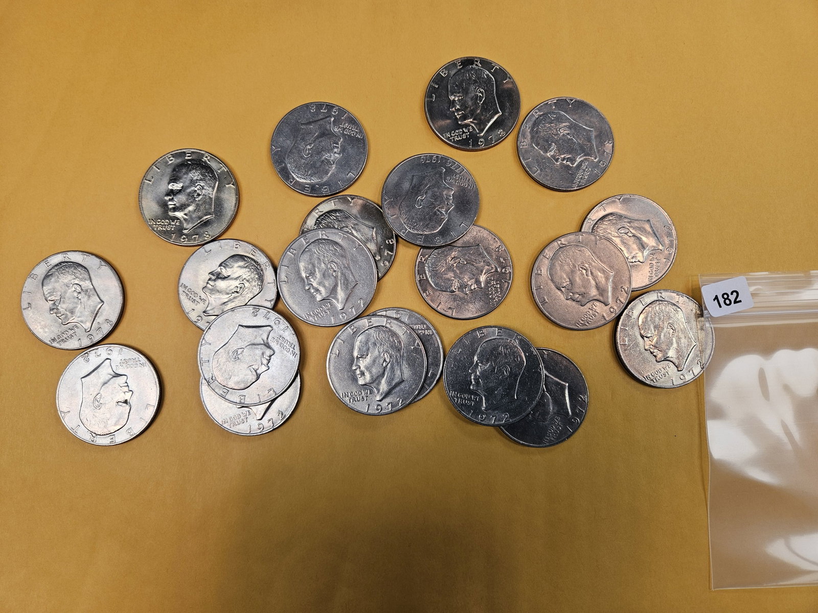 Twenty mixed Eisenhower Dollars: Mixed dates and grades