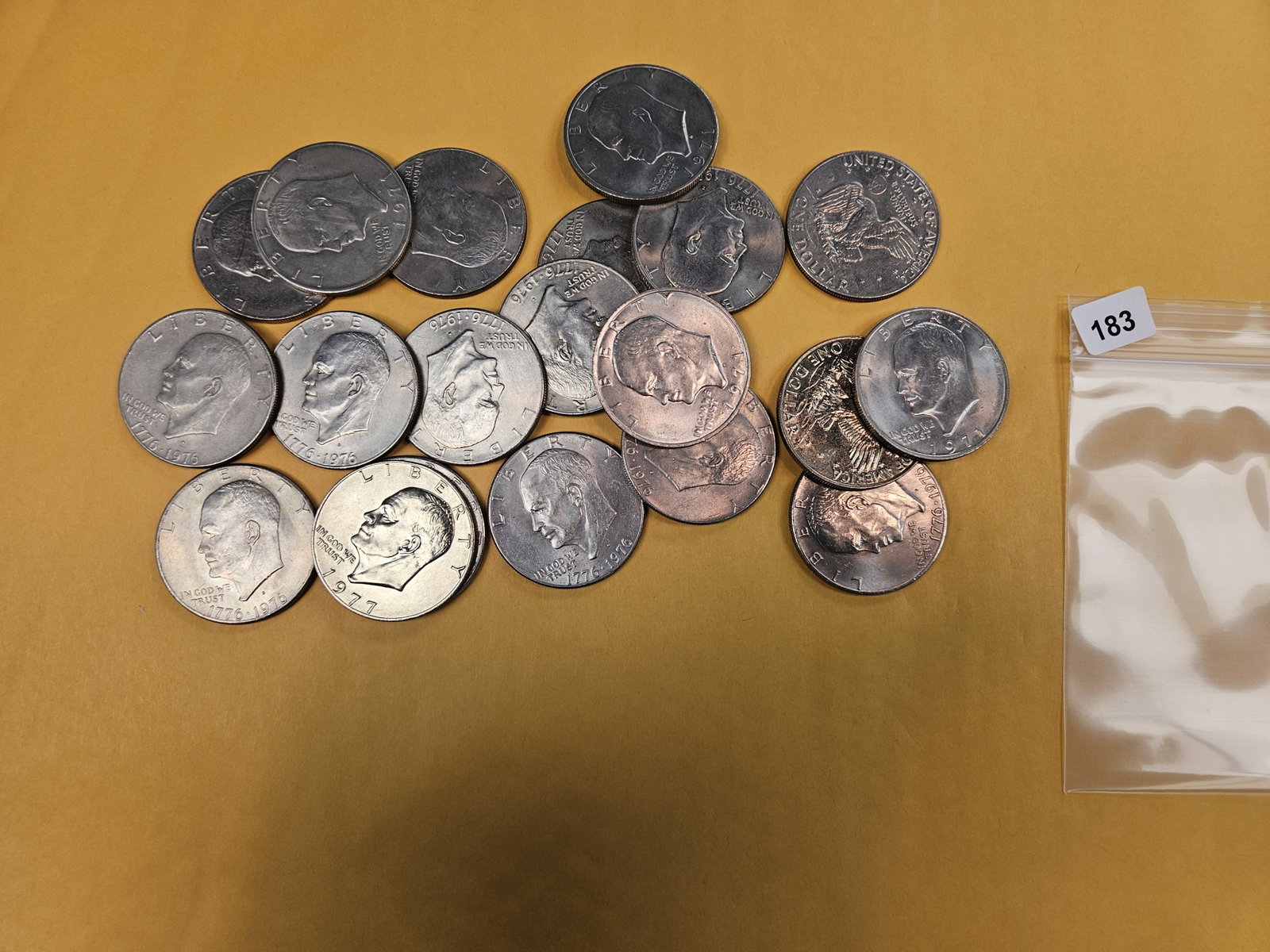 Twenty mixed Eisenhower Dollars: Mixed dates and grades