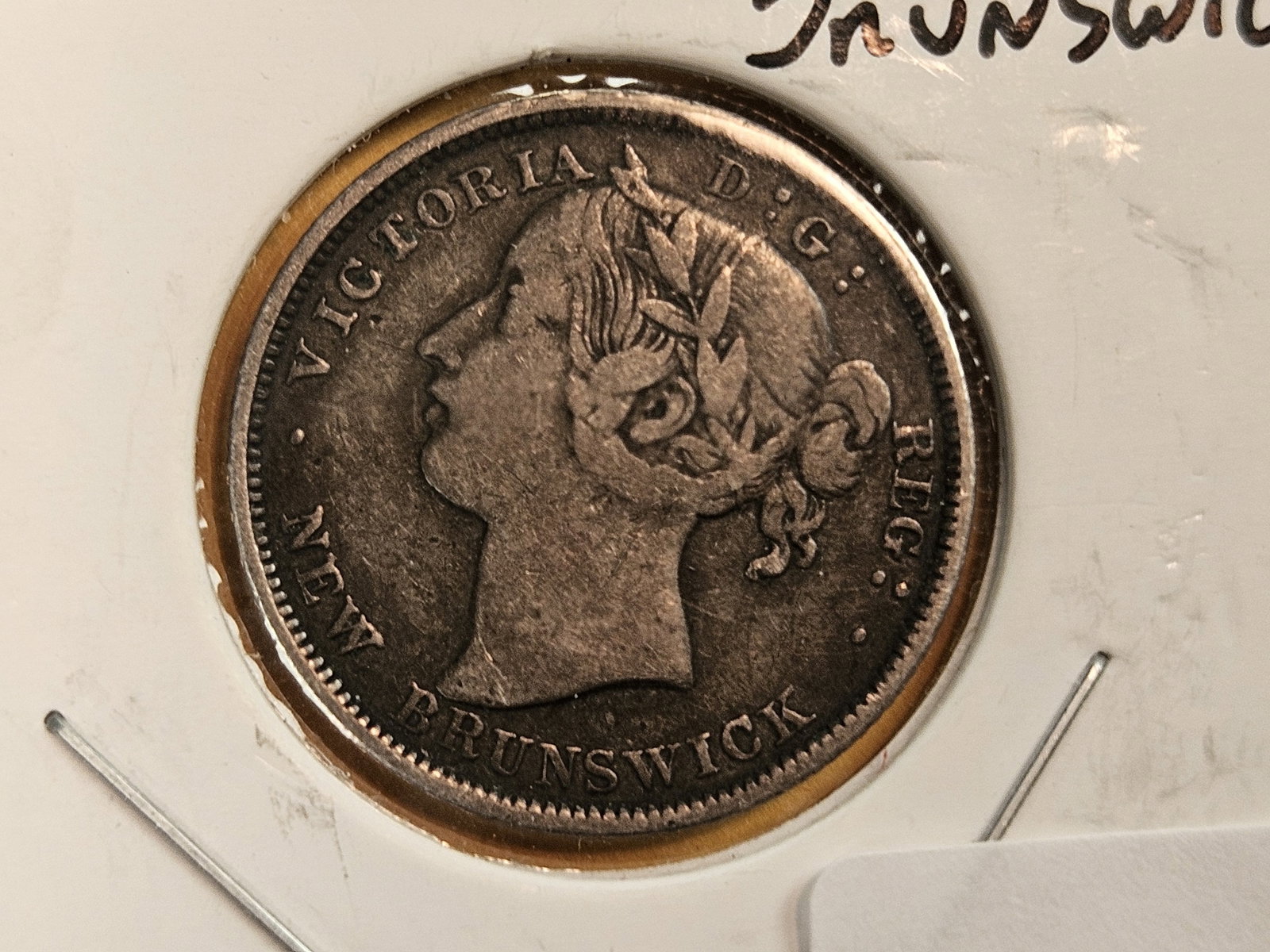 * 1862 New Brunswick silver 20 cents: KM # 9. Scarcer. Only a 2 year type