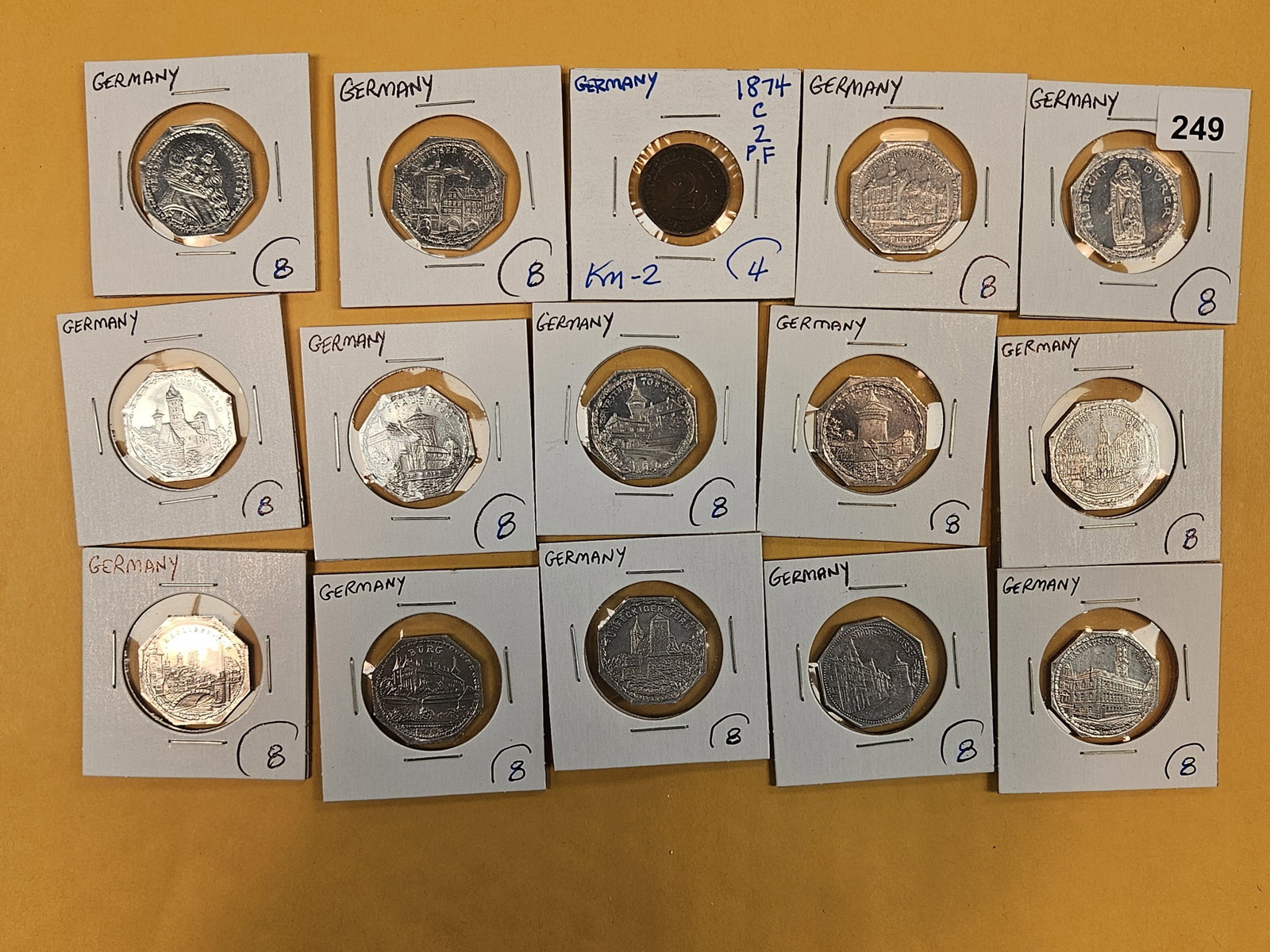 Fifteen mixed GEM German coins: All but one are octagonal