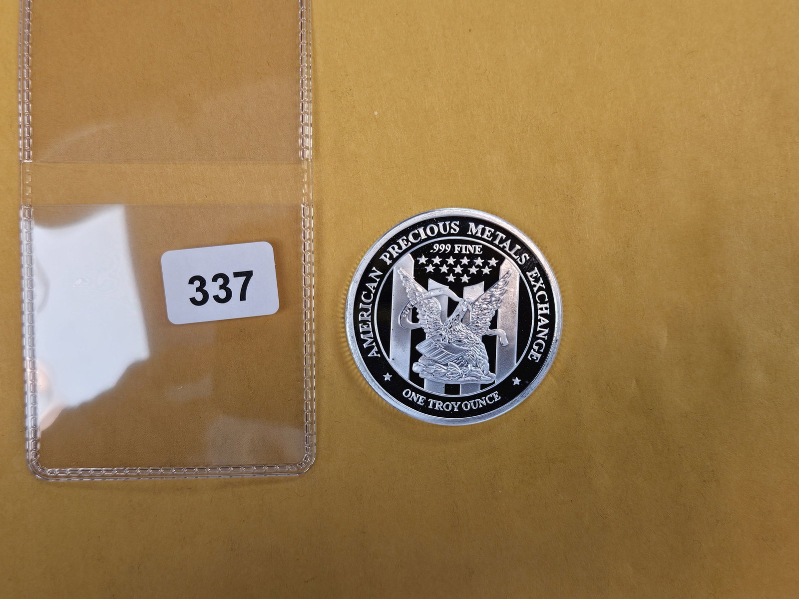 One Troy ounce .999 fine silver art round: APMEX