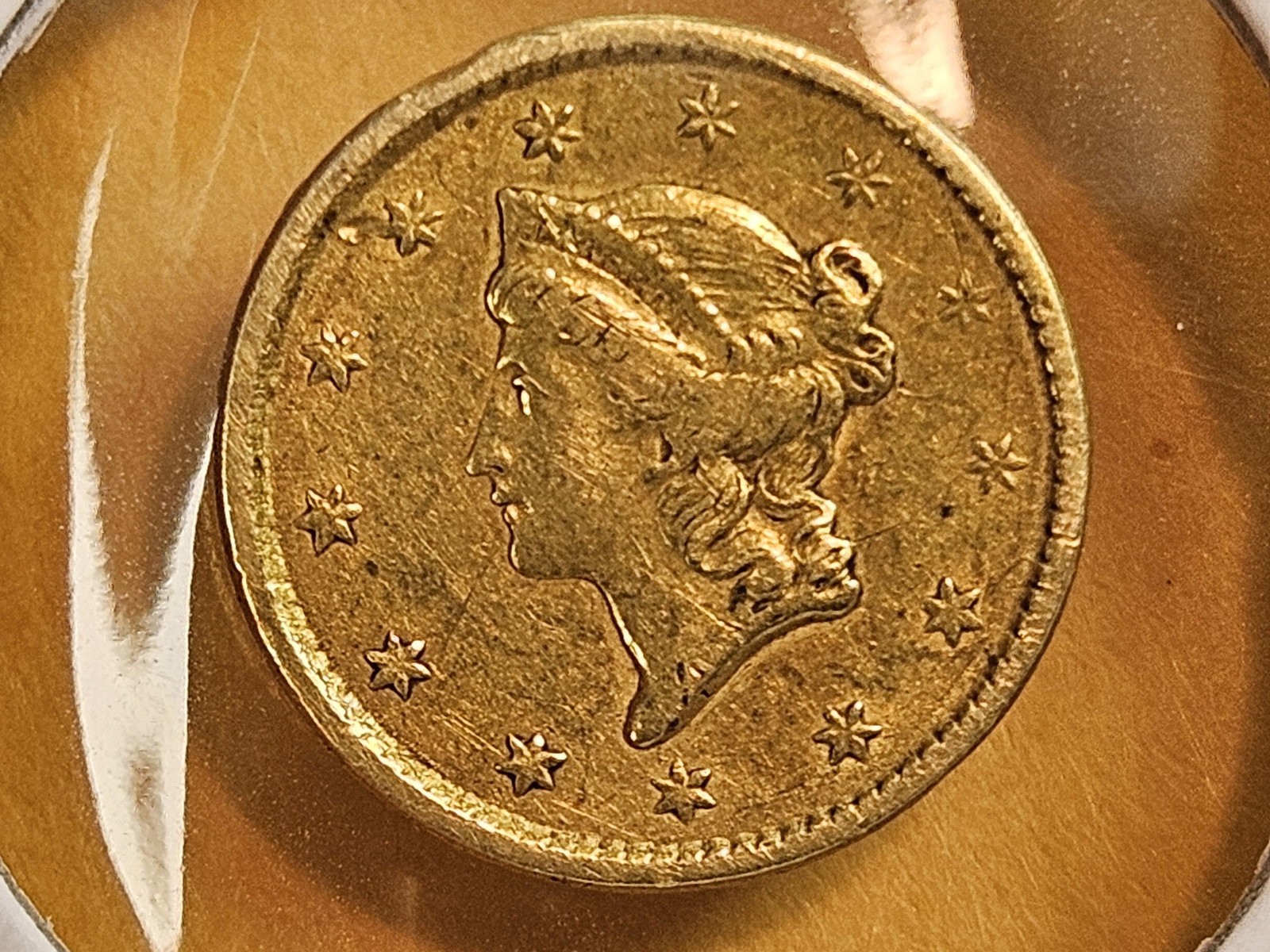 GOLD! 1851 Gold Dollar: Lightly circulated