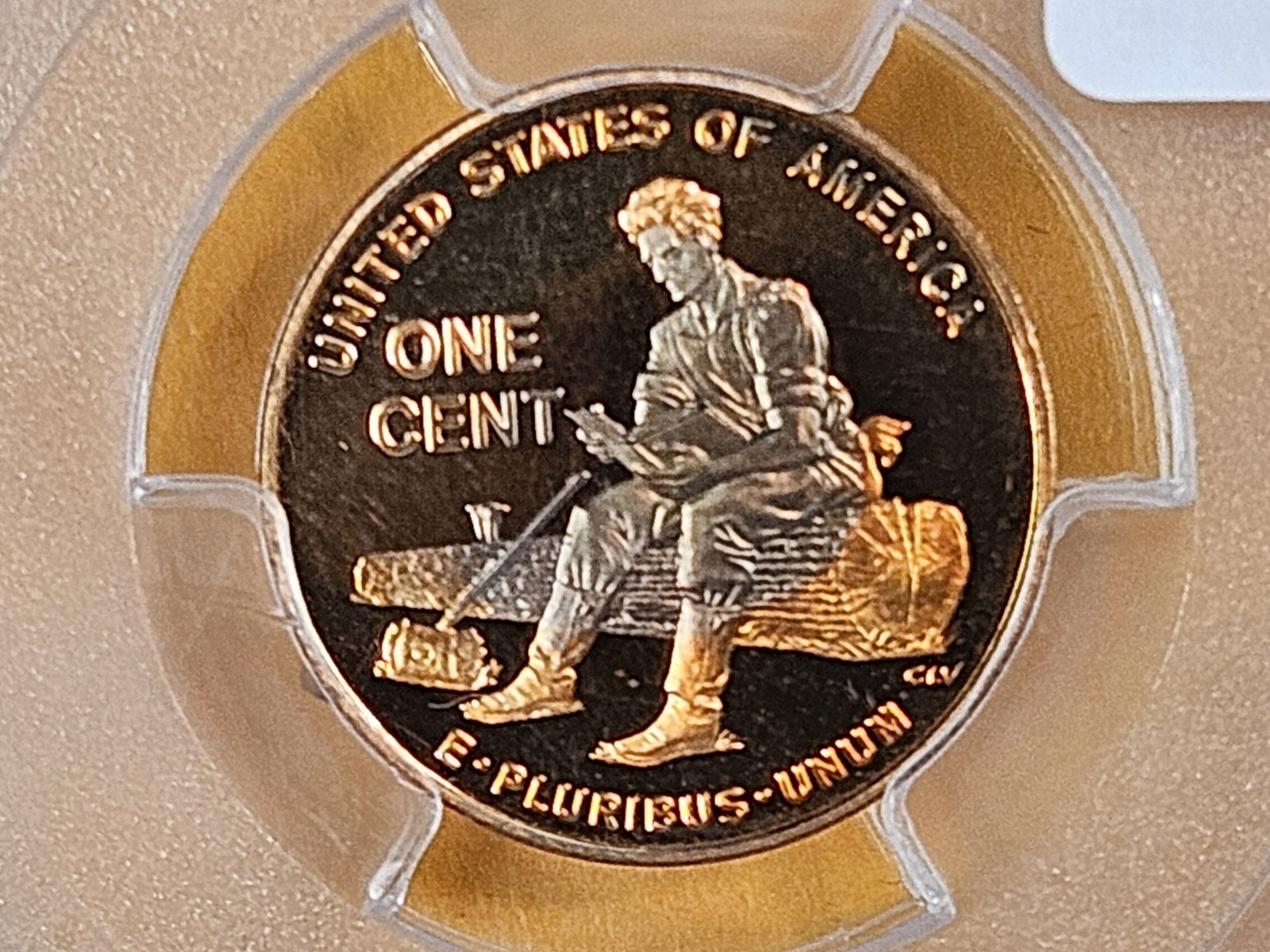 PCGS 2009-S Lincoln Cent in Proof 69 RED Deep Cameo: Not a big dlea of a coin, but it's got some cool bullseye toning!