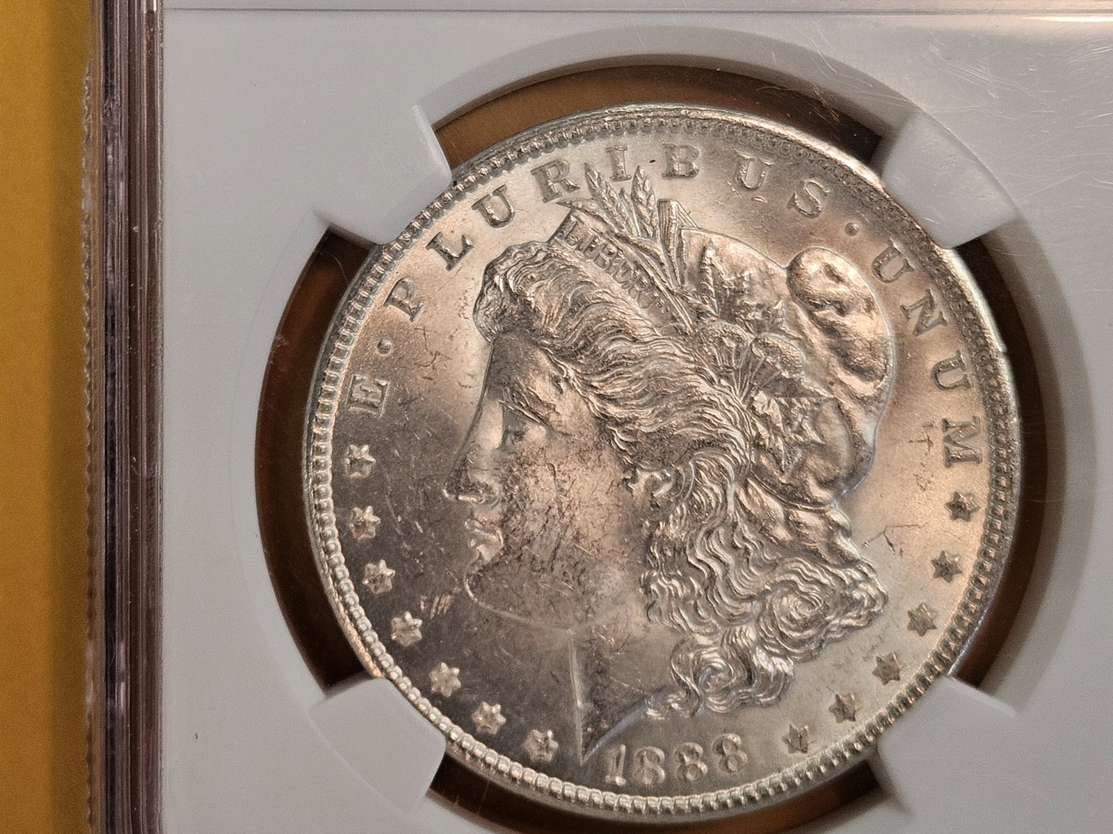 NGC 1888 Morgan Dollar in Mint State 63: Light patina