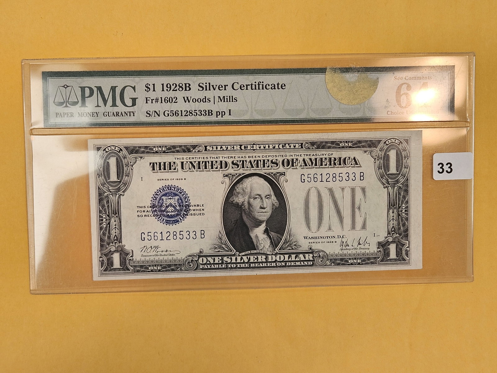 PMG 1928-B One Dollar Silver Certificate FUNNY BACK in CH UNC 64: Choice Uncirculated 64 Exceptional Paper Quality! FR $ 1602