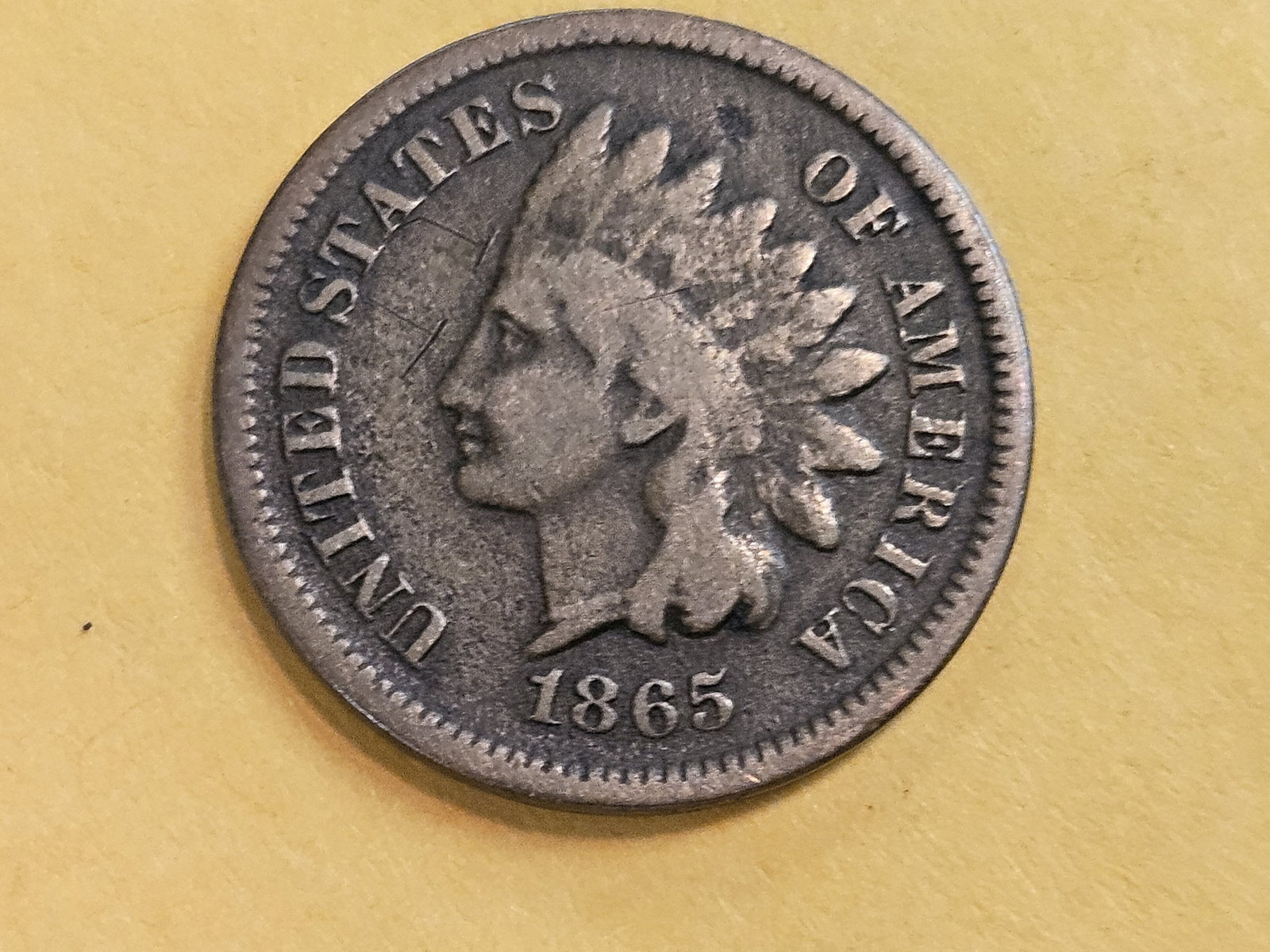 Better date 1865 Indian Cent: In Fine