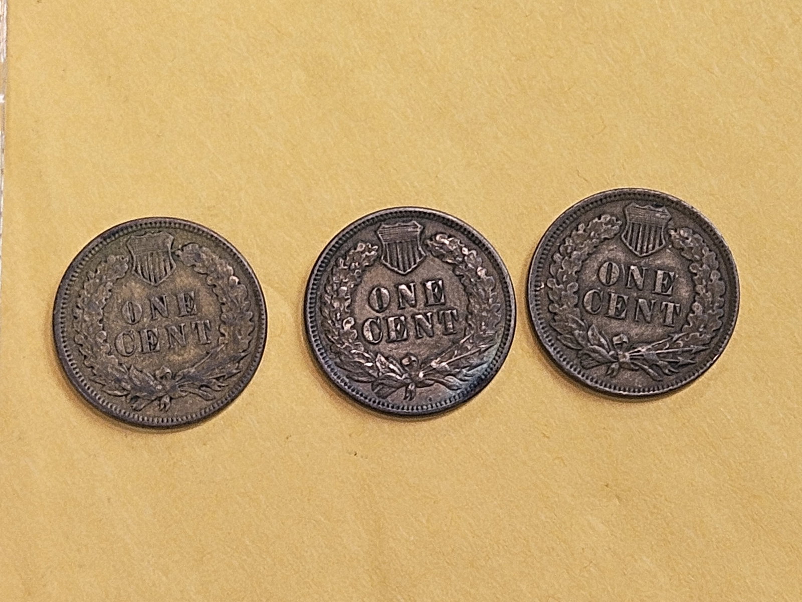 Three solid About Uncirculated plus Indian cents - 6