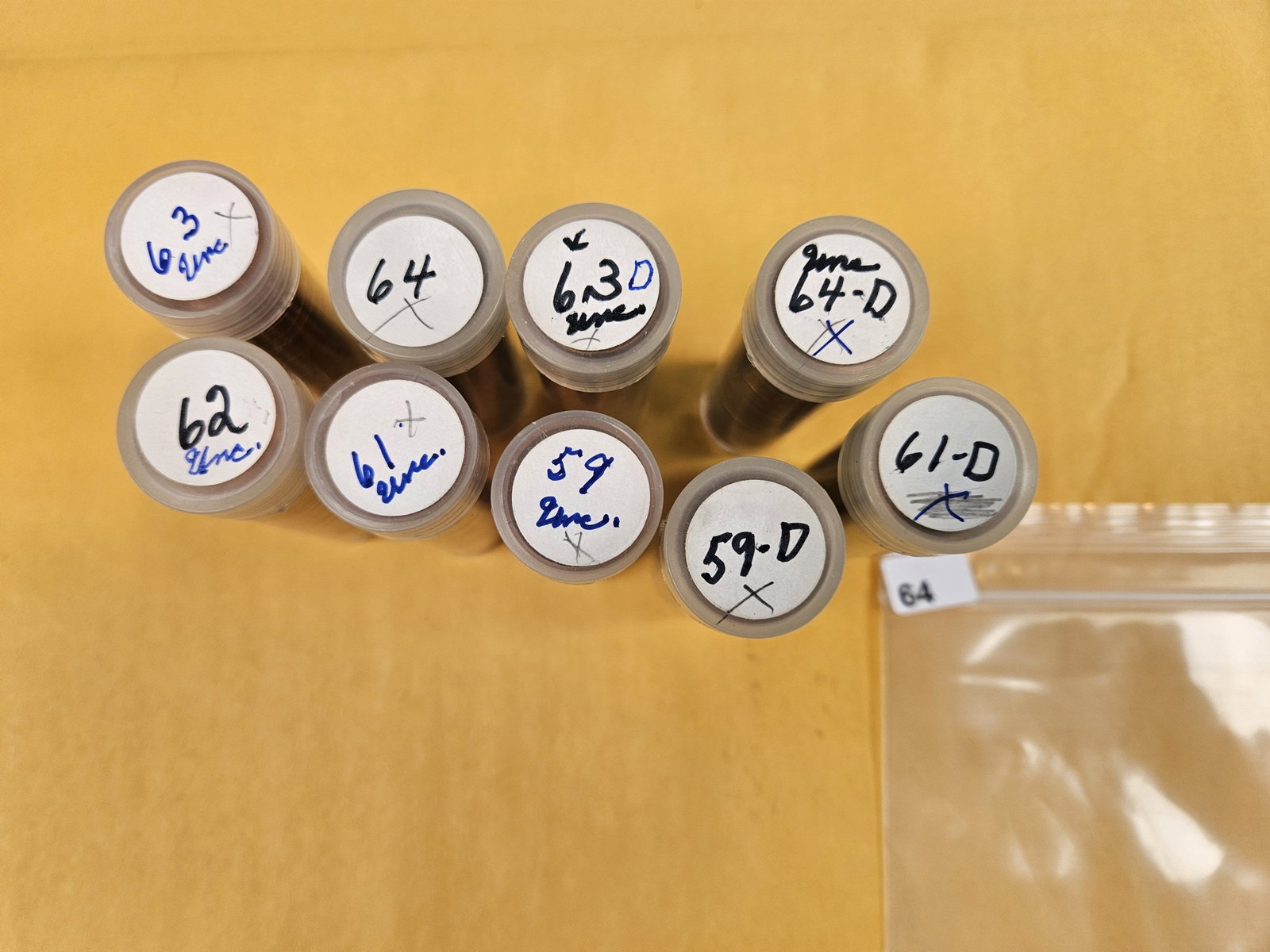 Nine Mixed Uncirculated Lincoln Cent rolls: 59's and 60's. Not all brilliant