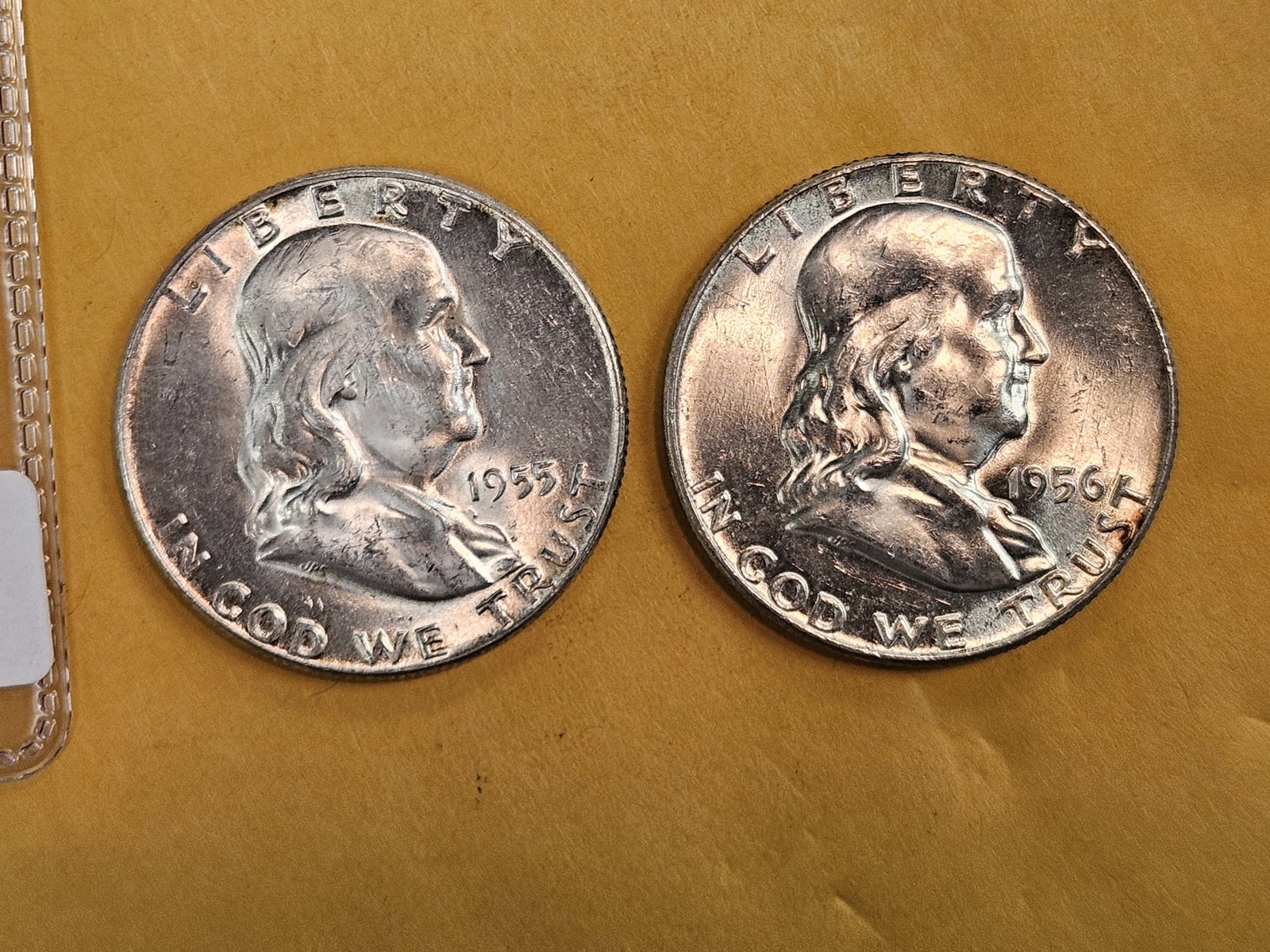 Two Very Choice Brilliant Uncirculated Franklin Half Dollars: 1955 and 1956. Both with nice luster