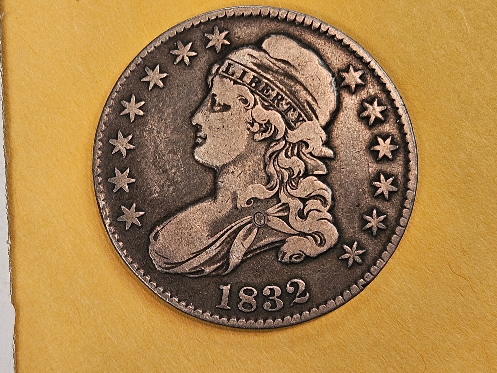 1832 Capped Bust Half Dollar in Very Fine plus: Solid.