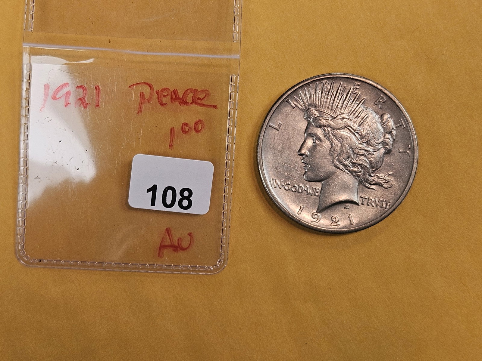 ** KEY DATE ** 1921 Peace silver Dollar in About Uncirculated - 2