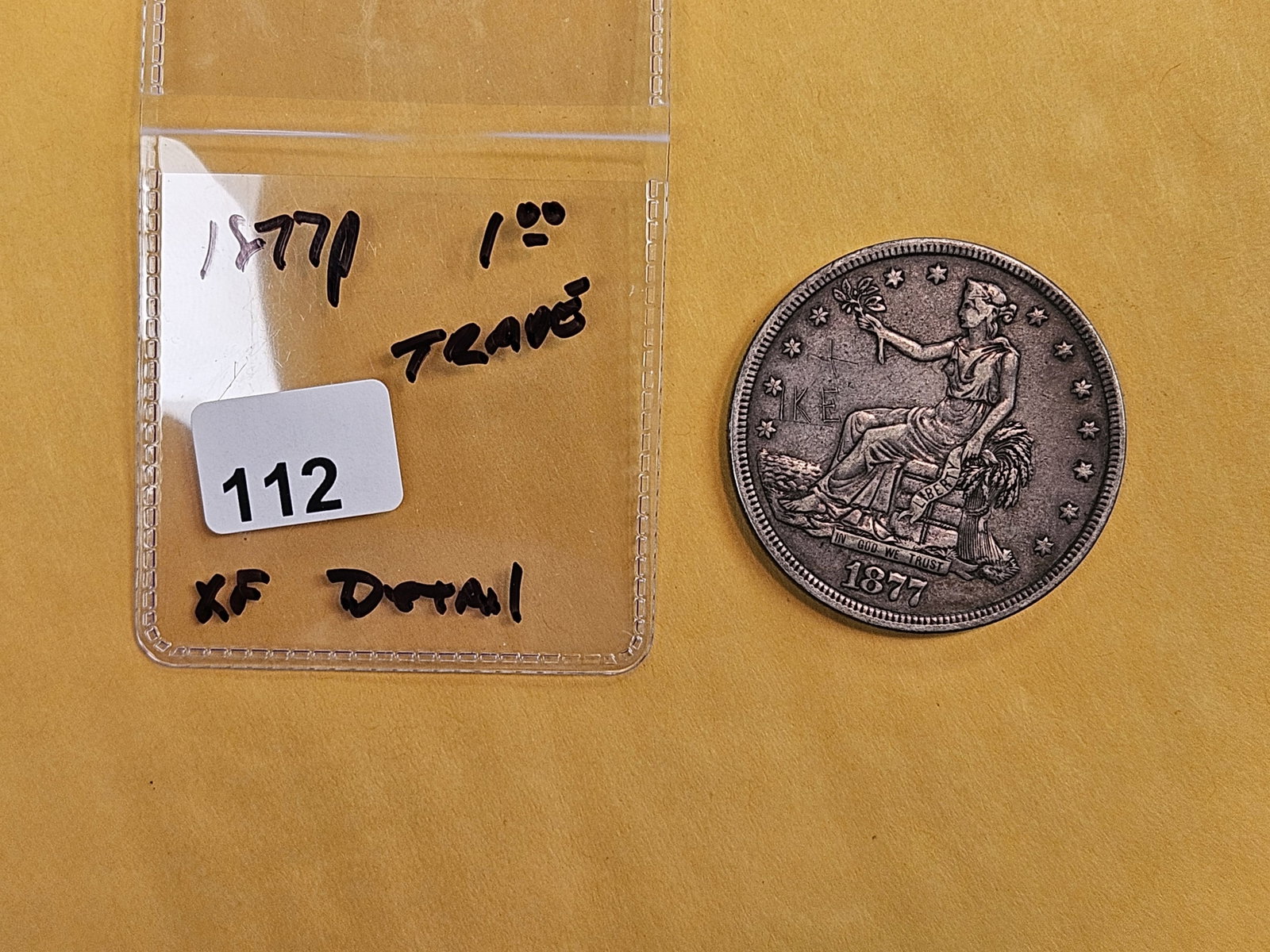 1877 Trade silver Dollar in Extra Fine - details - 2