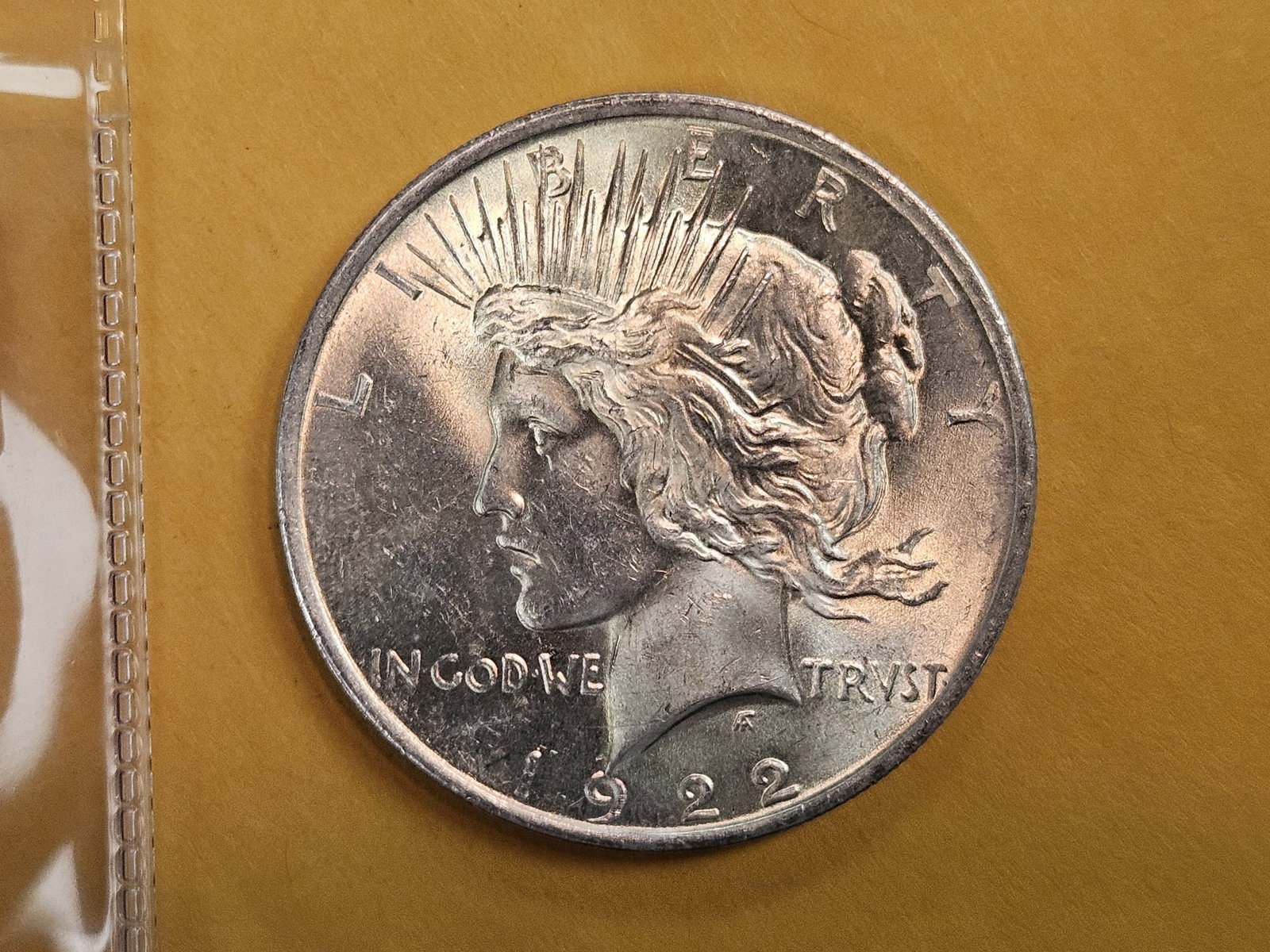 Choice Brilliant Uncirculated 1922 Peace silver Dollar: Deep contrast