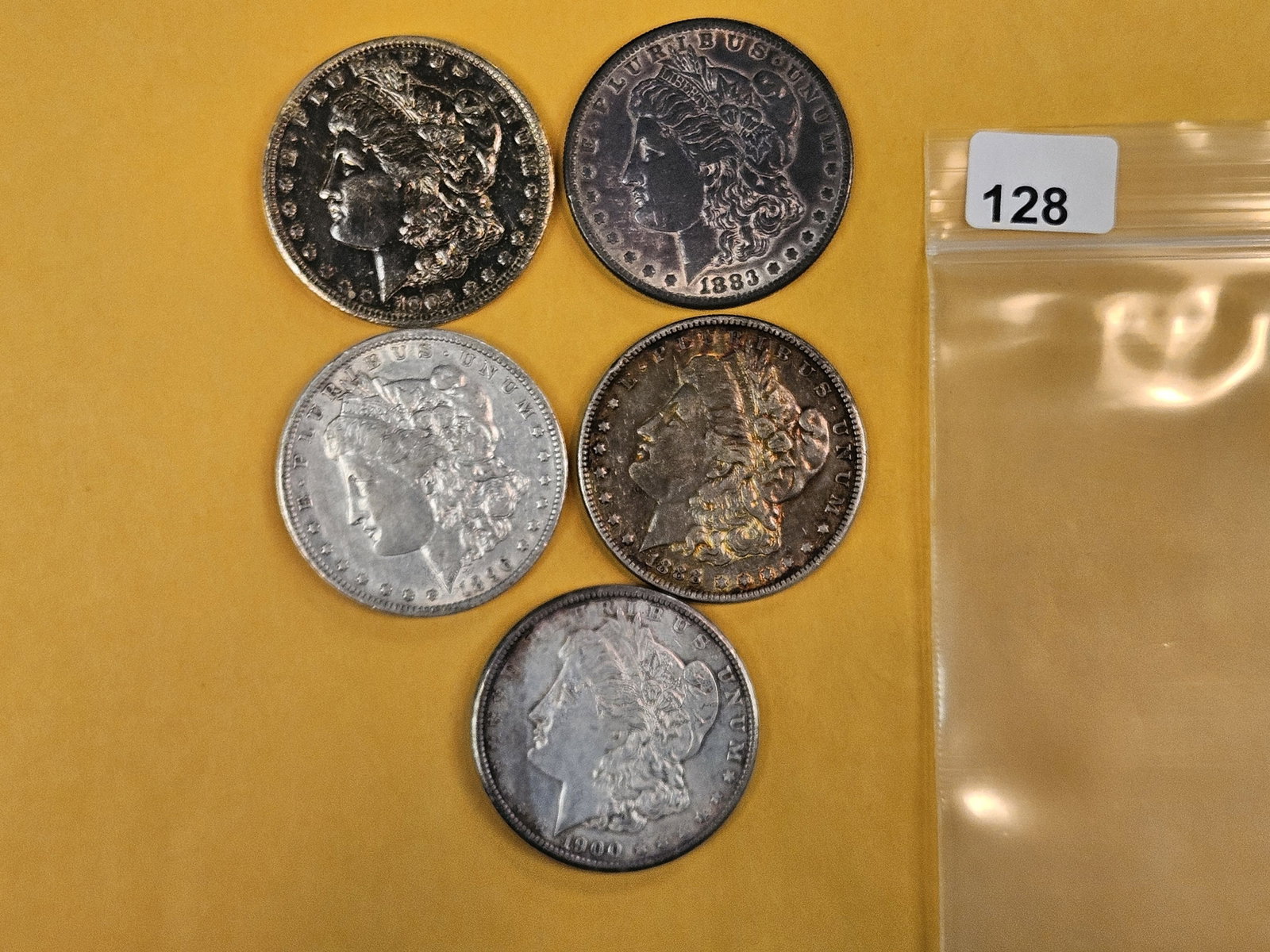 Five Morgan Silver Dollars (1 of 3)