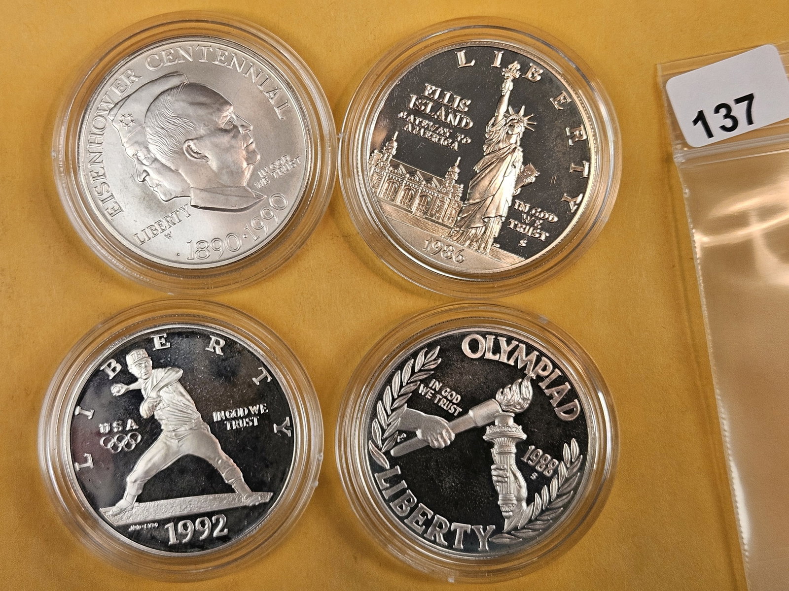 Four GEM Commemorative Silver Dollars: Proof and BU. In original plastic holders