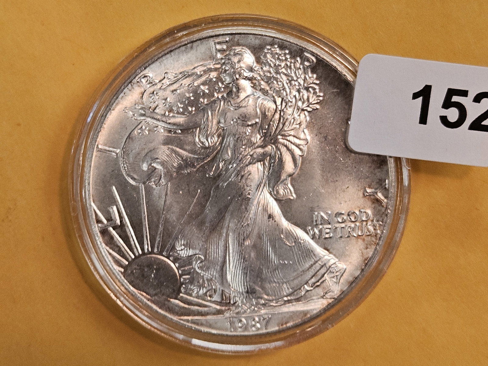 GEM Brilliant Uncirculated 1987 American Silver Eagle: In original plastic capsule