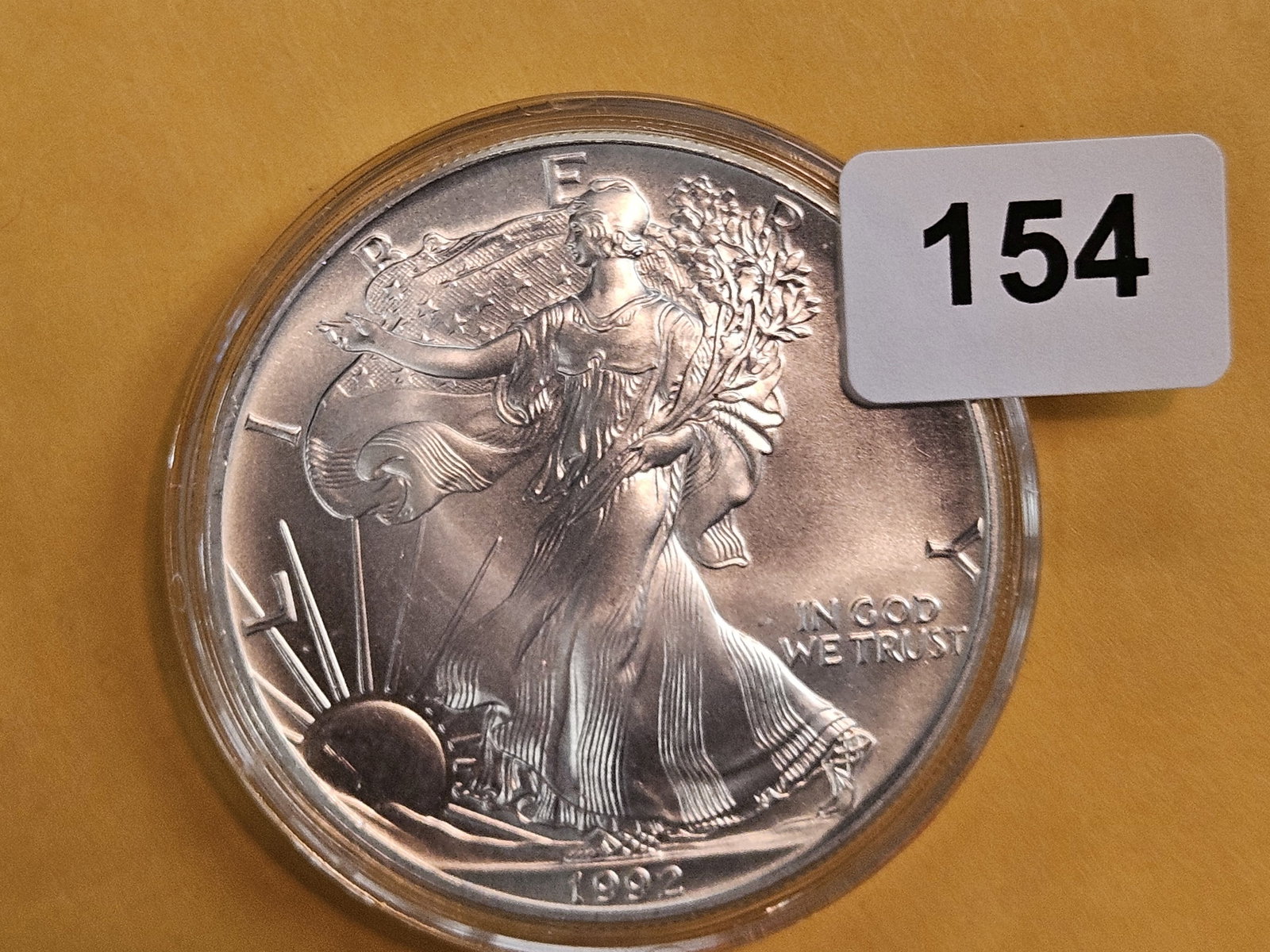GEM Brilliant Uncirculated 1992 American Silver Eagle: In original plastic capsule