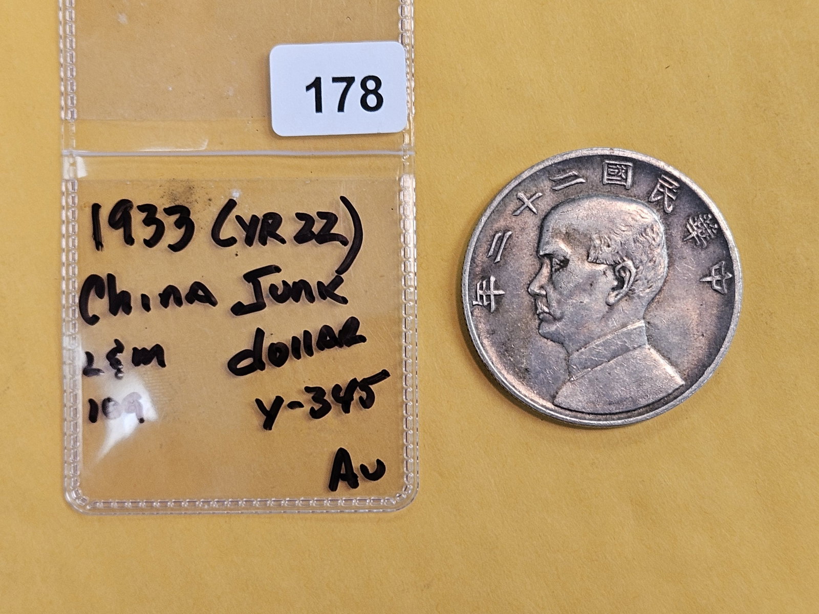 1933 China Silver "Junk" Dollar in About Uncirculated - 2