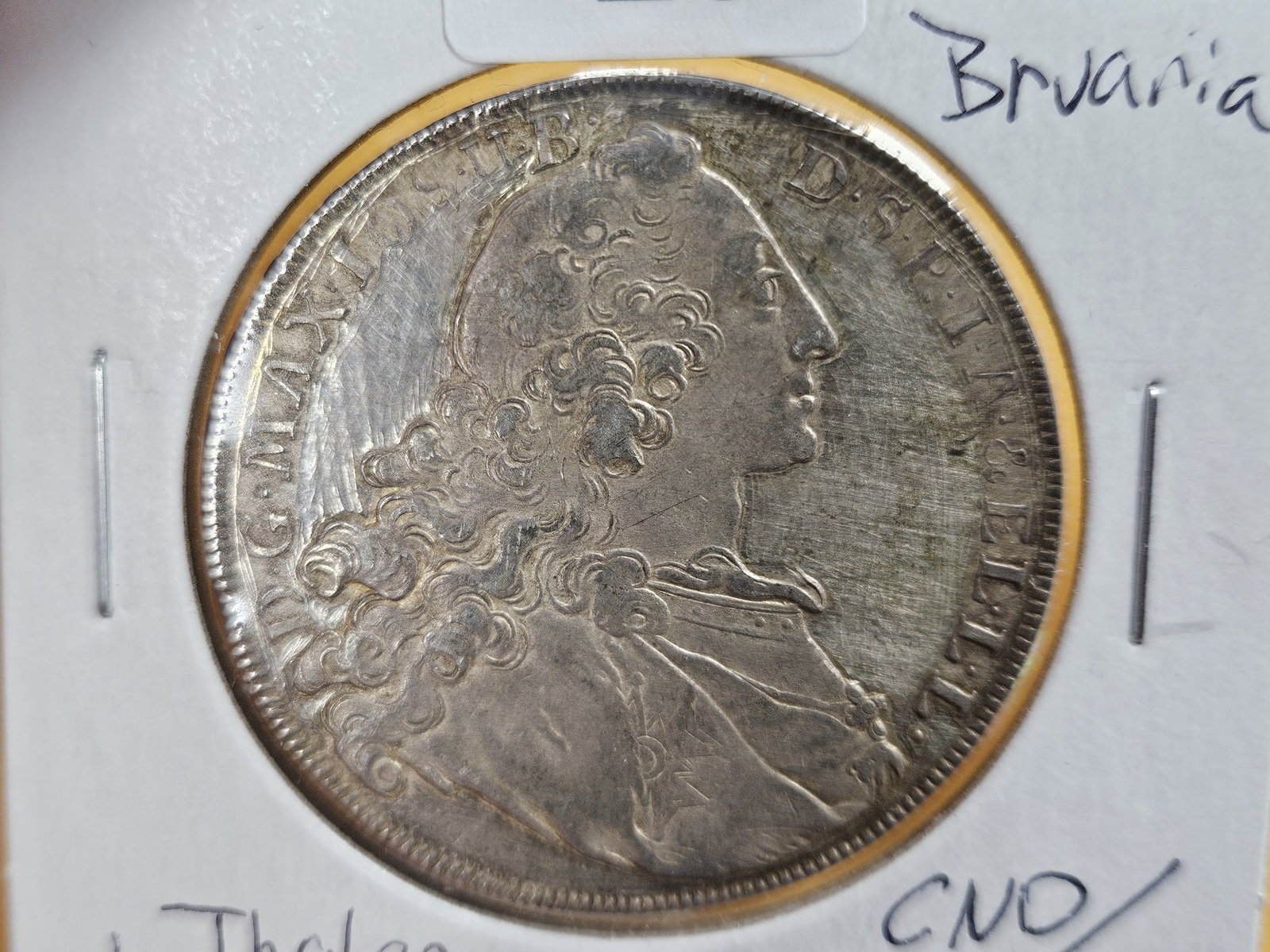 1763 German States Bavaria Silver Thaler: KM 519.1. Looks About Uncirculated but has a lot of marks from someone trying to re-engrave the fields
