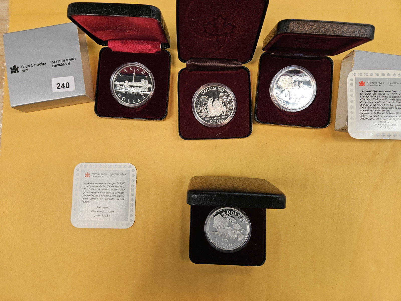 Four GEM Proof Canadian Silver Dollars: All in original boxes. Couple with COAs