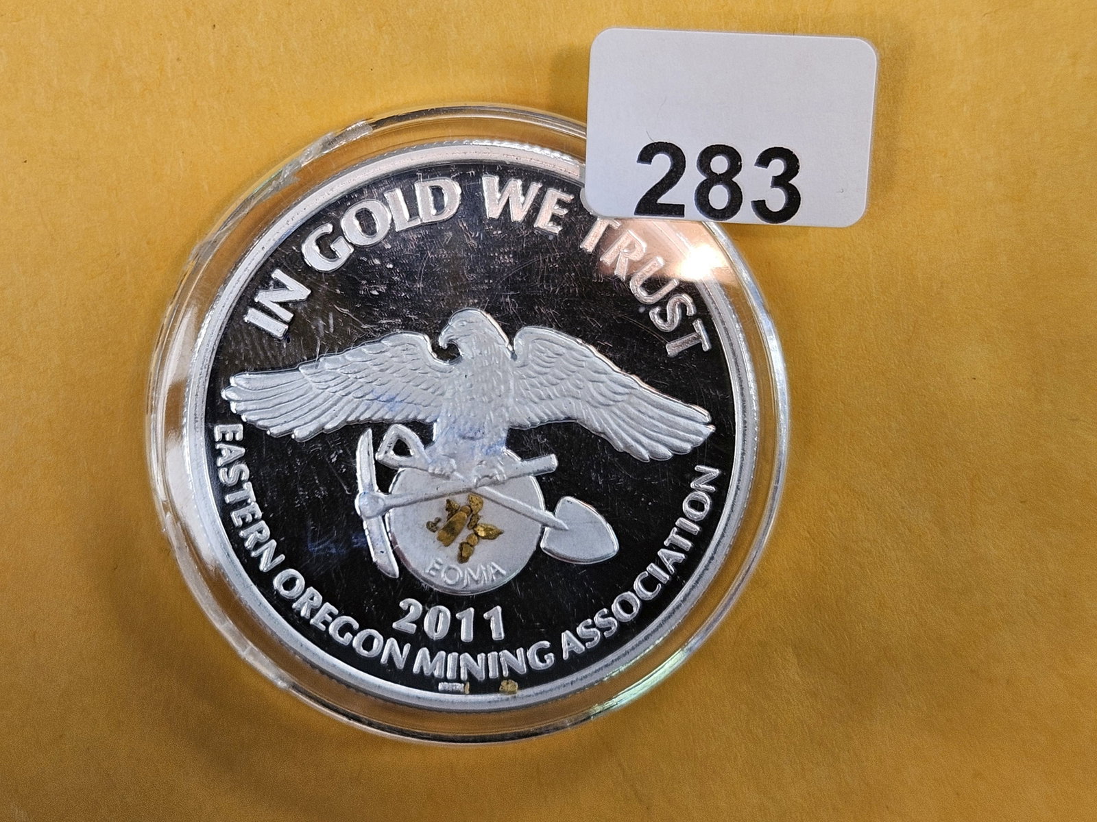 SILVER And GOLD!!: One troy ounce .999 fine silver round with what looks like NINE gold nuggets embedded in it!