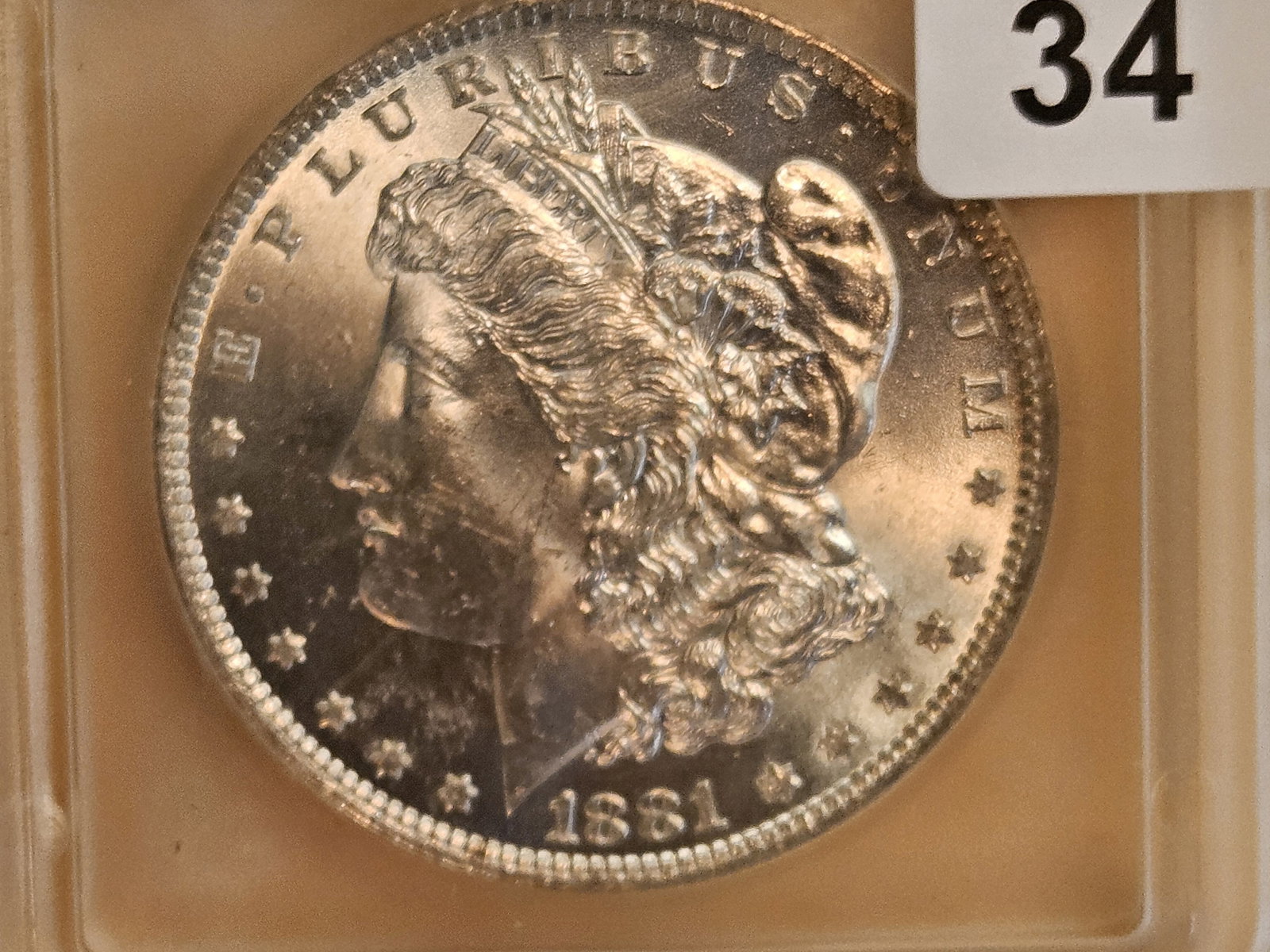 ICG 1881-O Morgan Dollar in Mint State 63: Super clean fields