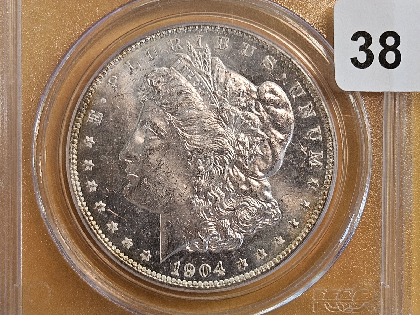 PCGS 1904-O Morgan Dollar in Mint State 63: Near Prooflike fields