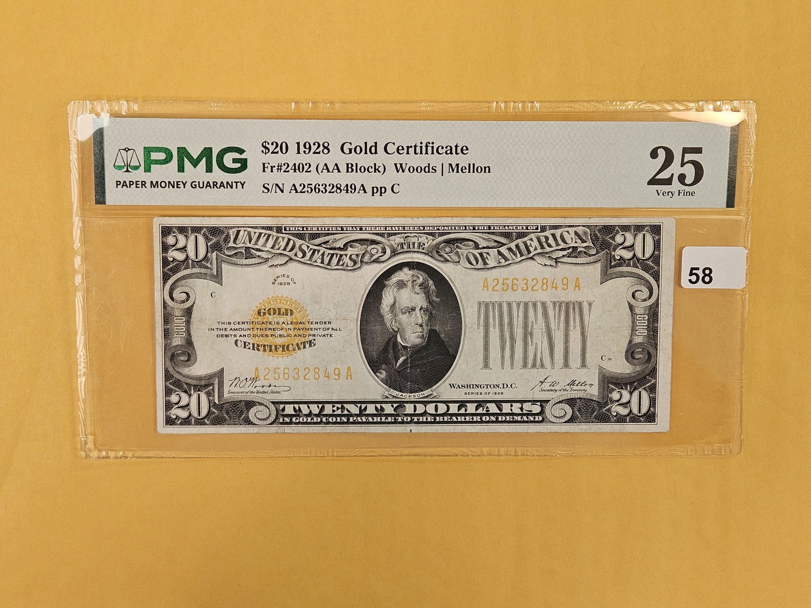 PMG 1928 Twenty Dollar Gold Certificate in Very Fine - 25: FR # 2402. AA Block. Woods-Mellon