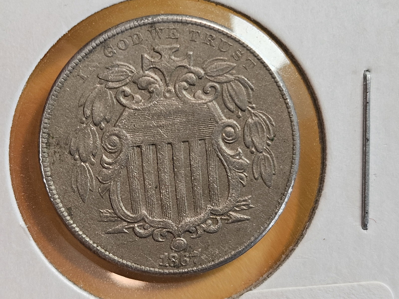 1867 Shield Nickel in About Uncirculated: Light porosity on the obverse