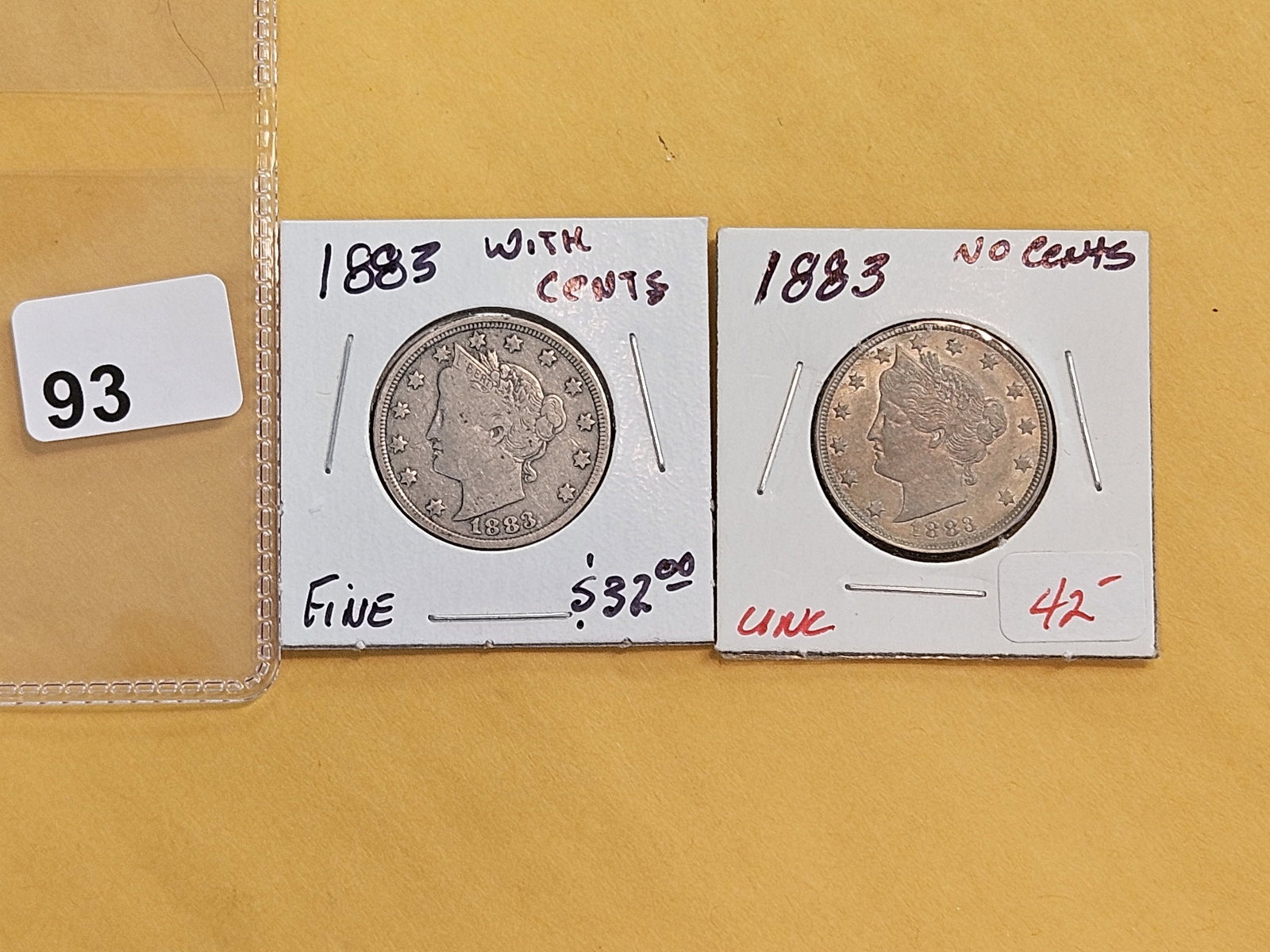 Both version of 1883 Liberty "V" Nickels: With and Without Cents. In Fine and Uncirculated