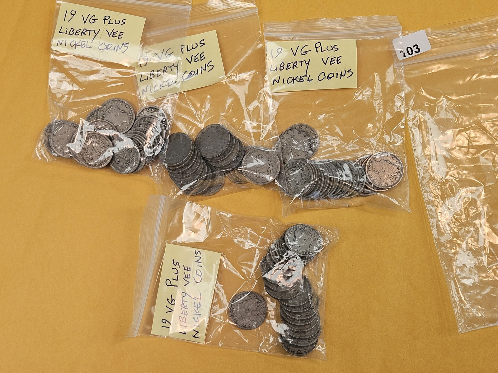 Four mixed bags of Liberty "V" Nickels: From dealer. All say there are 19 in each one. And, that's definitely a different way to spell "V" for a V-Nickel! Unchecked by us