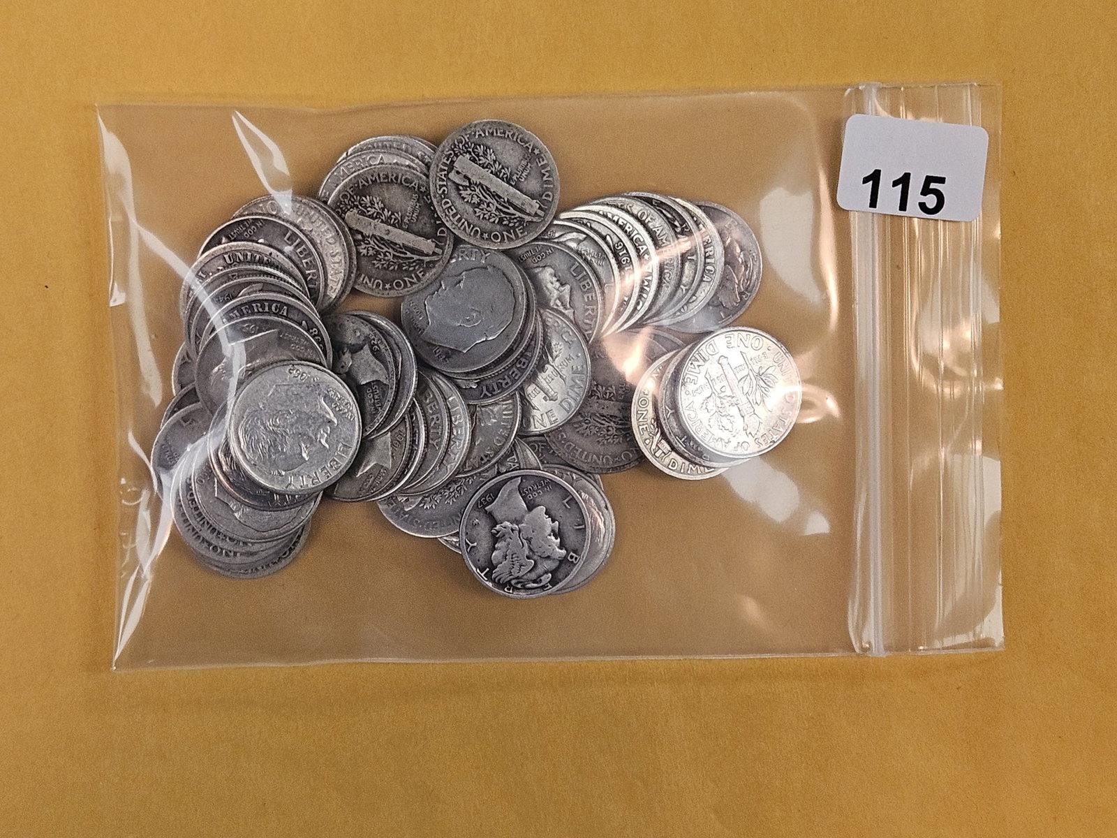 Fifty-Four mixed silver Dimes: Barber, Roosevelt, and Mercury