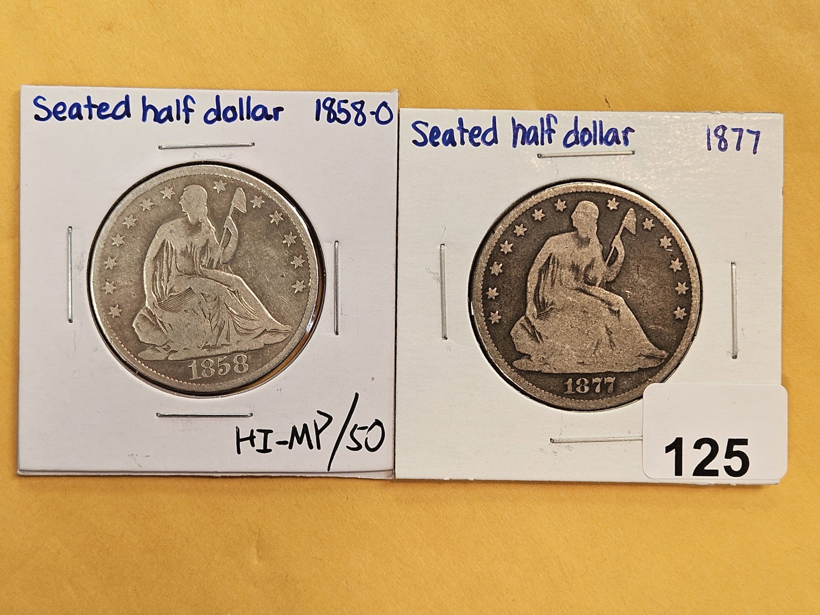 1858-O and 1877 Seated Liberty silver Half Dollars: Both circulated