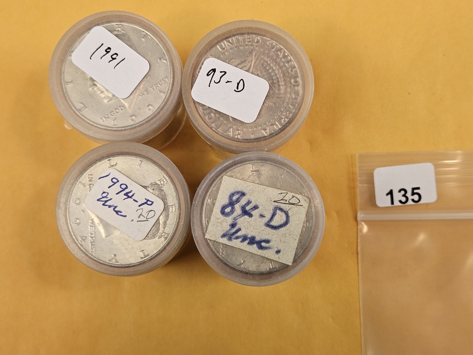 Four mixed, Brilliant Uncirculated Rolls of Kennedy Half Dollars: Dates on top. From an old collection. Unchecked by us