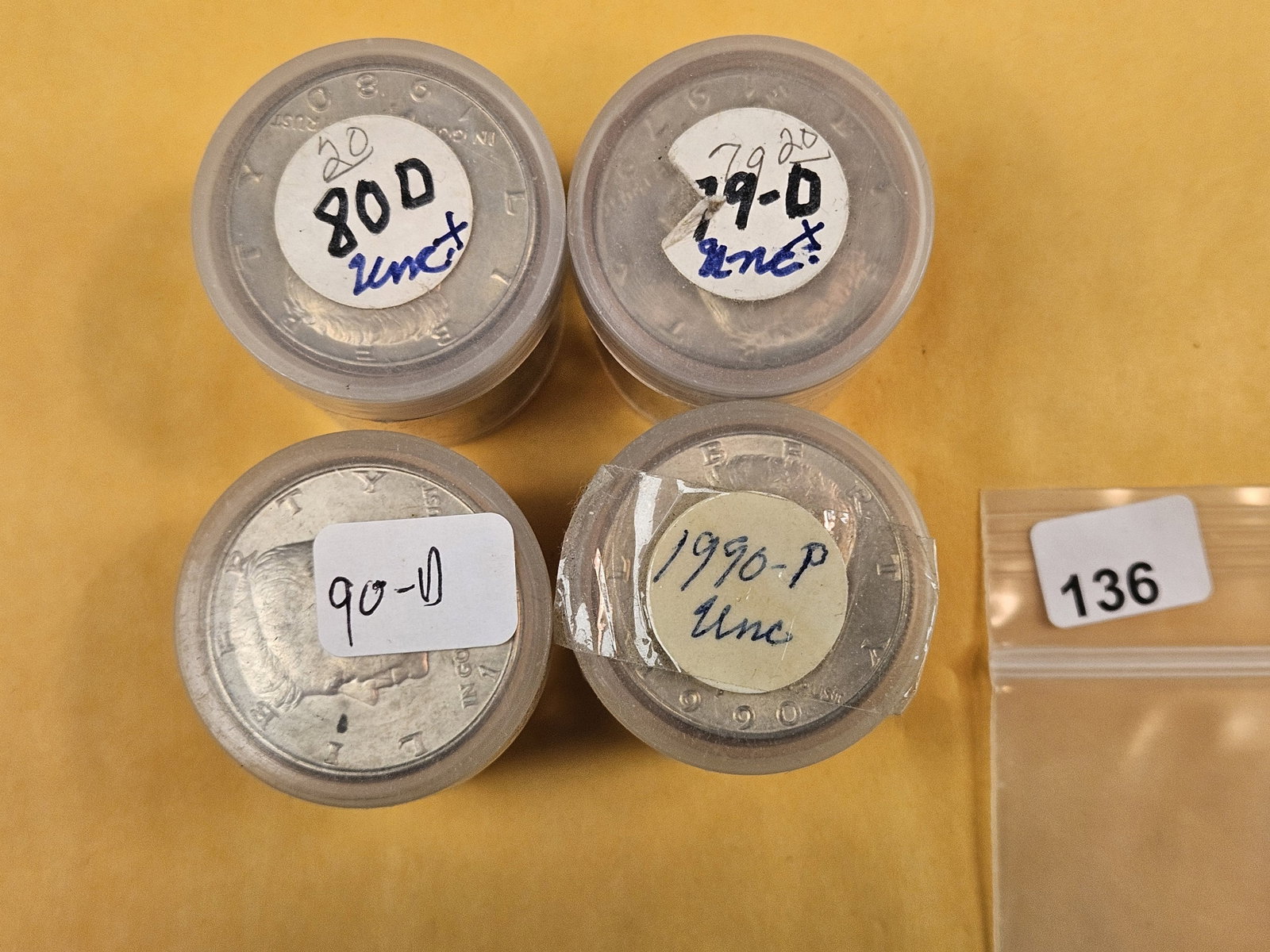 Four mixed, Brilliant Uncirculated Rolls of Kennedy Half Dollars: Dates on top. From an old collection. Unchecked by us