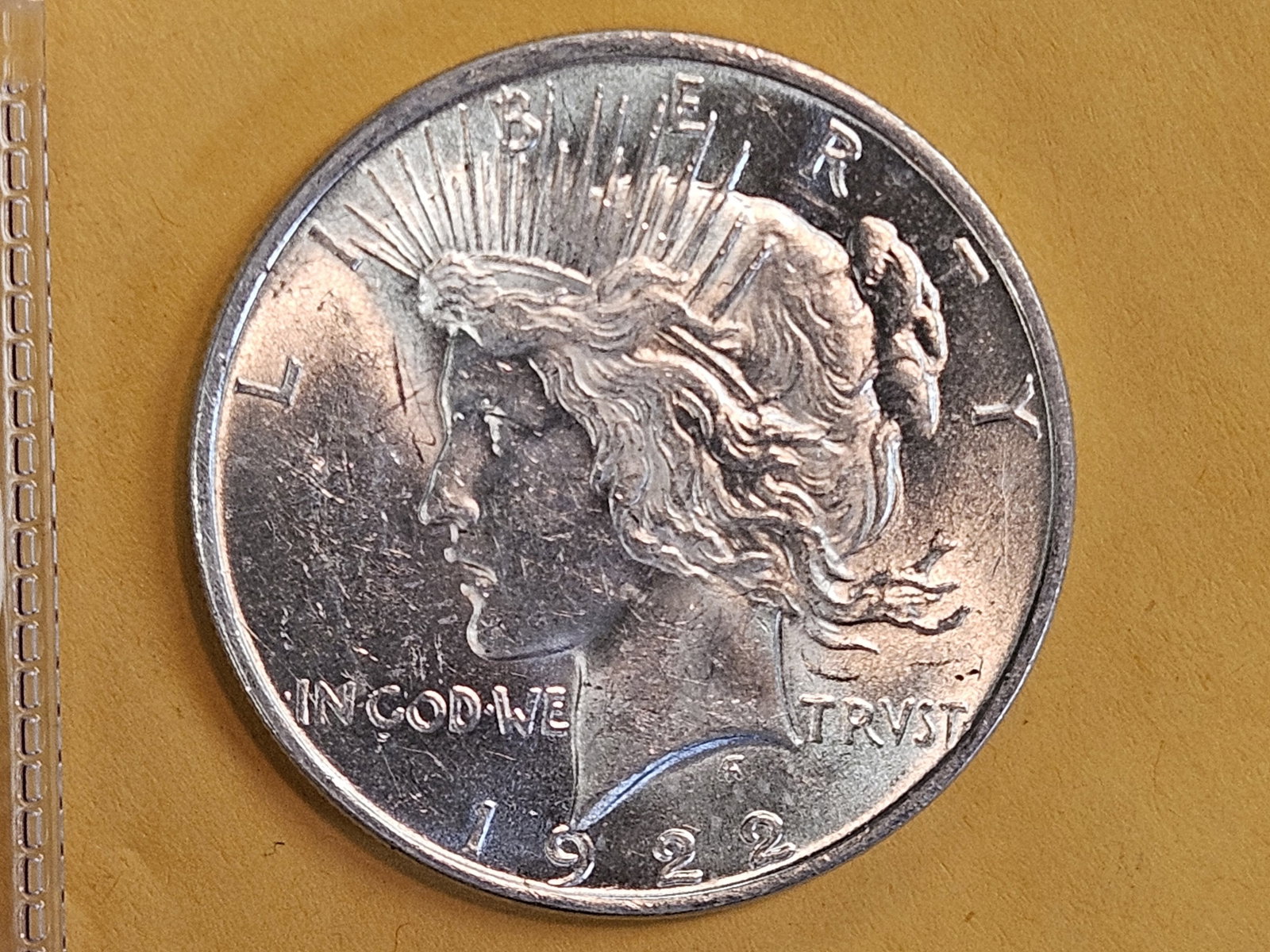 Brilliant Uncirculated plus 1922 Peace Silver Dollar: Great contrast