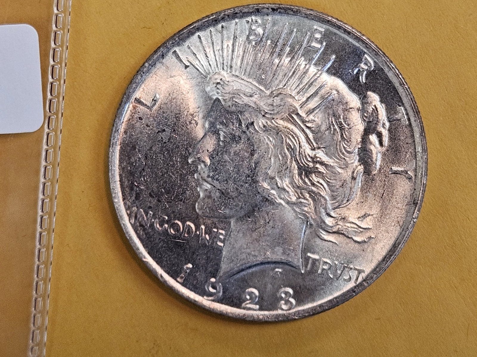 Brilliant Uncirculated plus 1923 Peace Silver Dollar: Great contrast