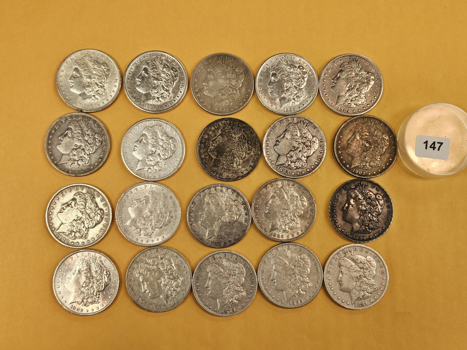 ** FULL ROLL ** Twenty Morgan Silver Dollars: All pre-1904. Grades from Fine through Brilliant Uncirculated - details