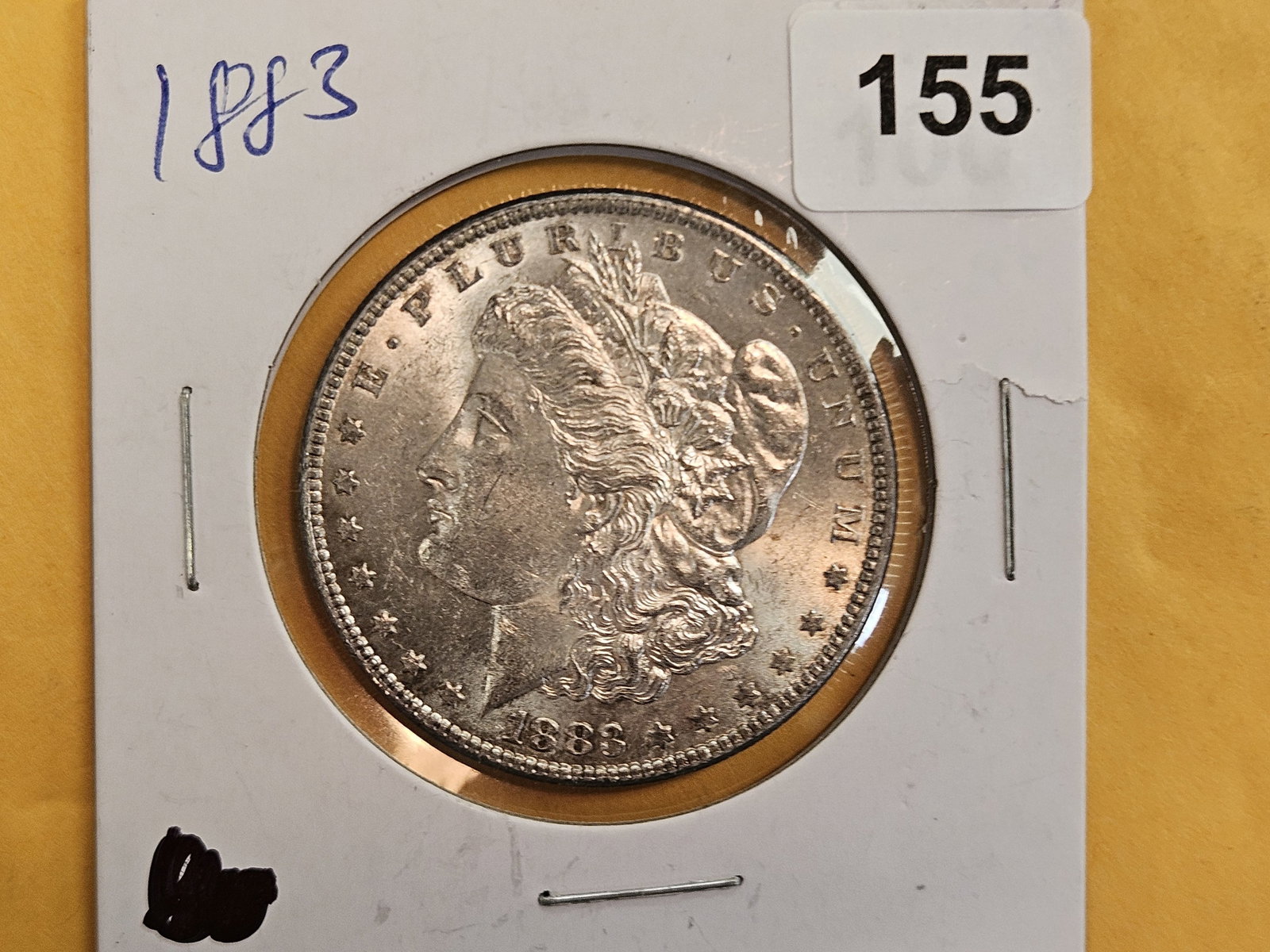 Choice brilliant Uncirculated plus 1883 Morgan Dollar: Toned obverse