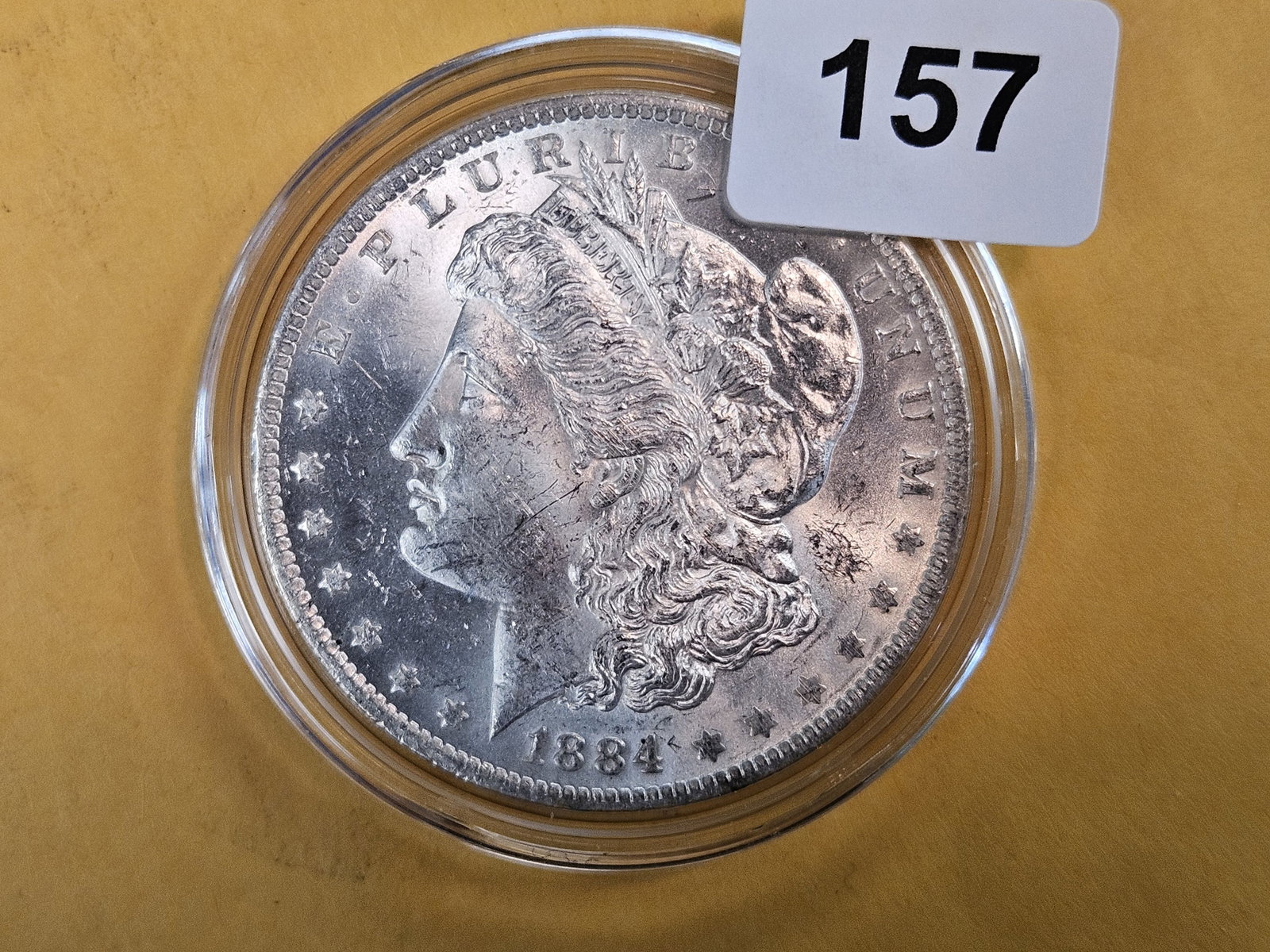 Choice Brilliant Uncirculated 1884-O Morgan Dollar: In capsule