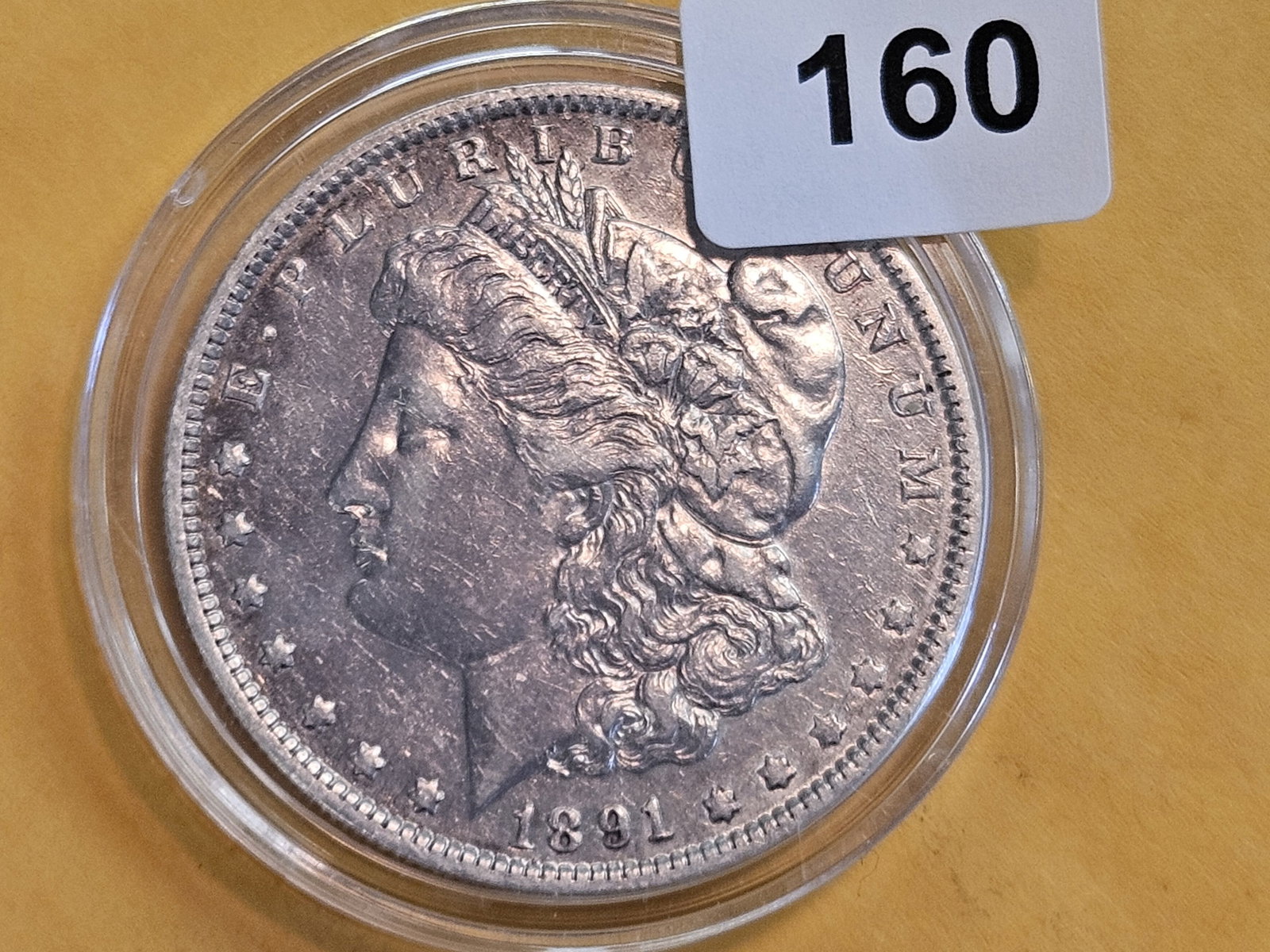 Better Date 1891-O Morgan Dollar: In About Uncirculated