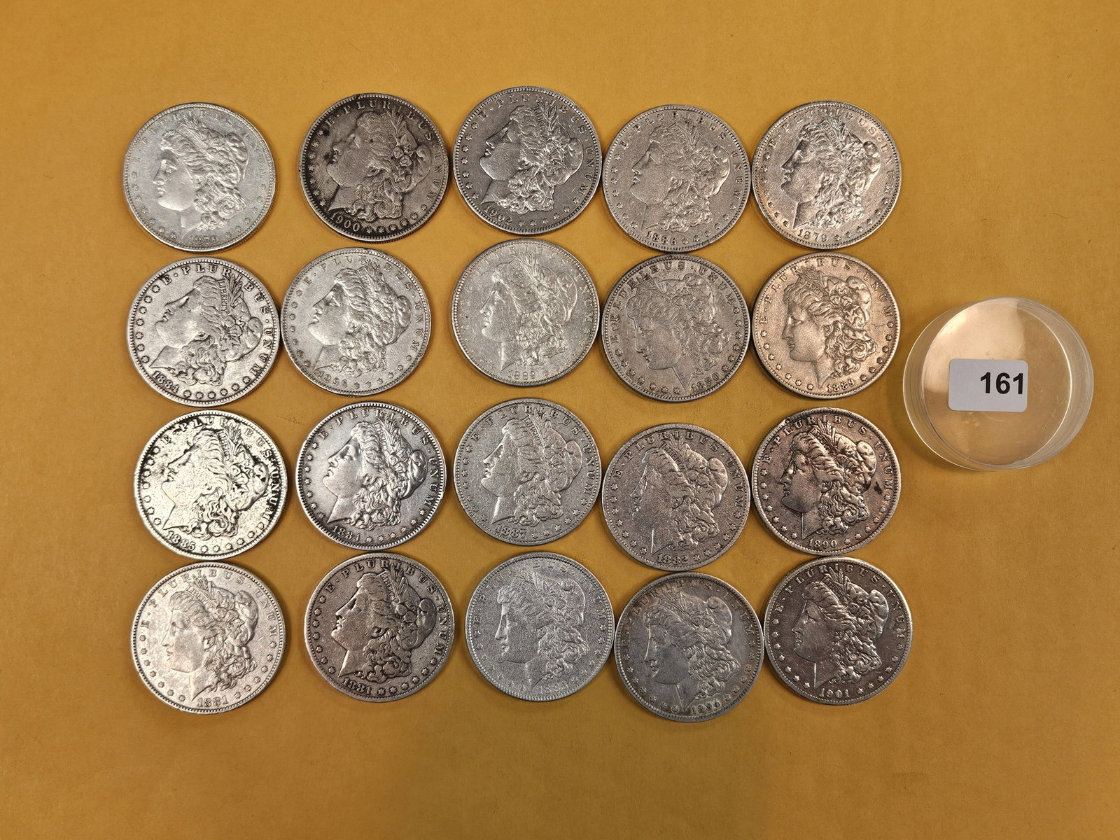 ** FULL ROLL ** Twenty Morgan Silver Dollars: All pre-1904. Grades from Very Good through Brilliant Uncirculated - details