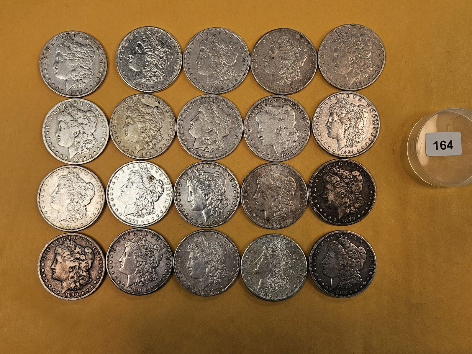 ** FULL ROLL ** Twenty Morgan Silver Dollars: All pre-1904. Grades from Fine through Brilliant Uncirculated - details