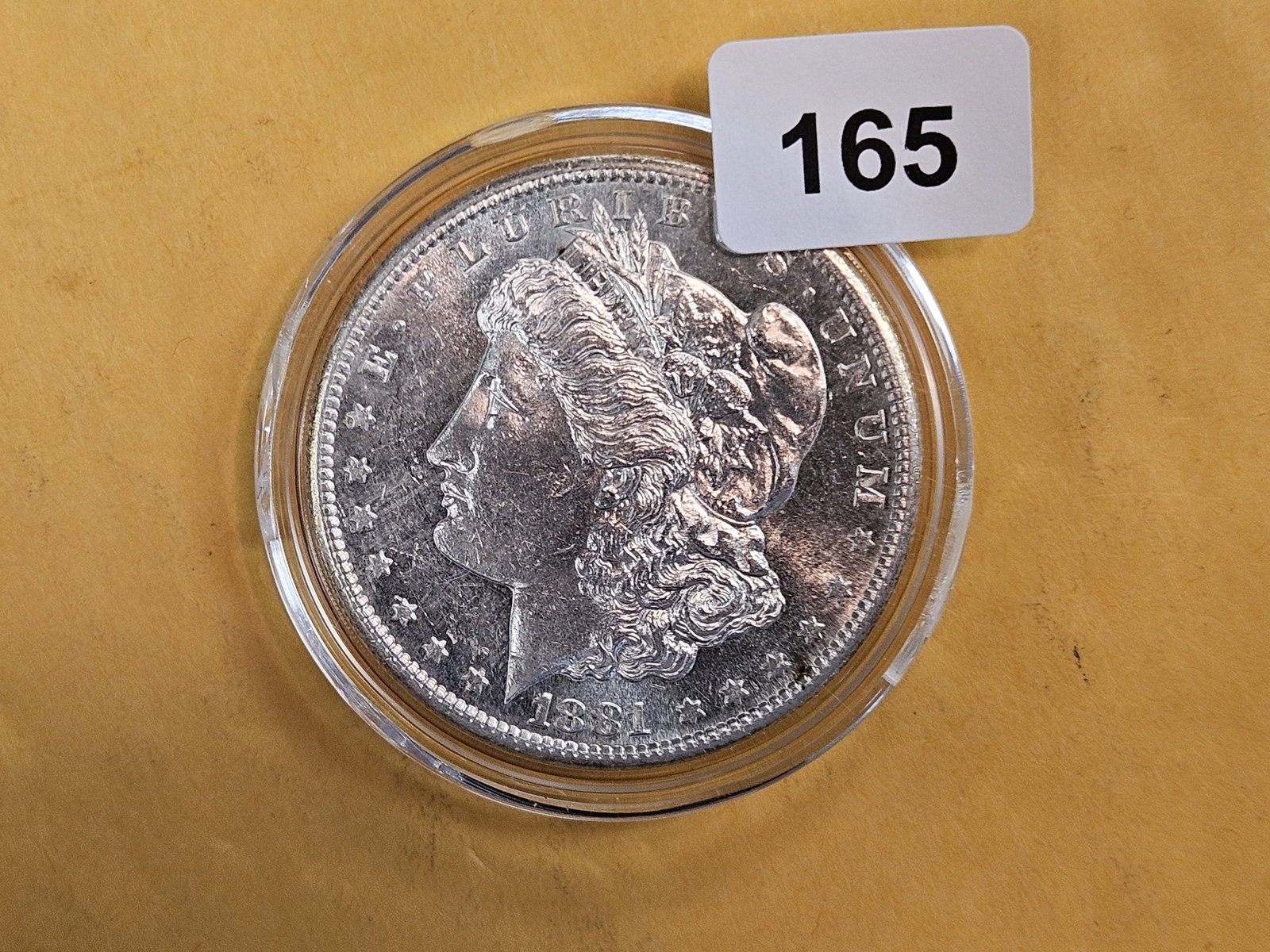 Choice Brilliant Uncirculated plus 1881-S Morgan Dollar: Near prooflike fields