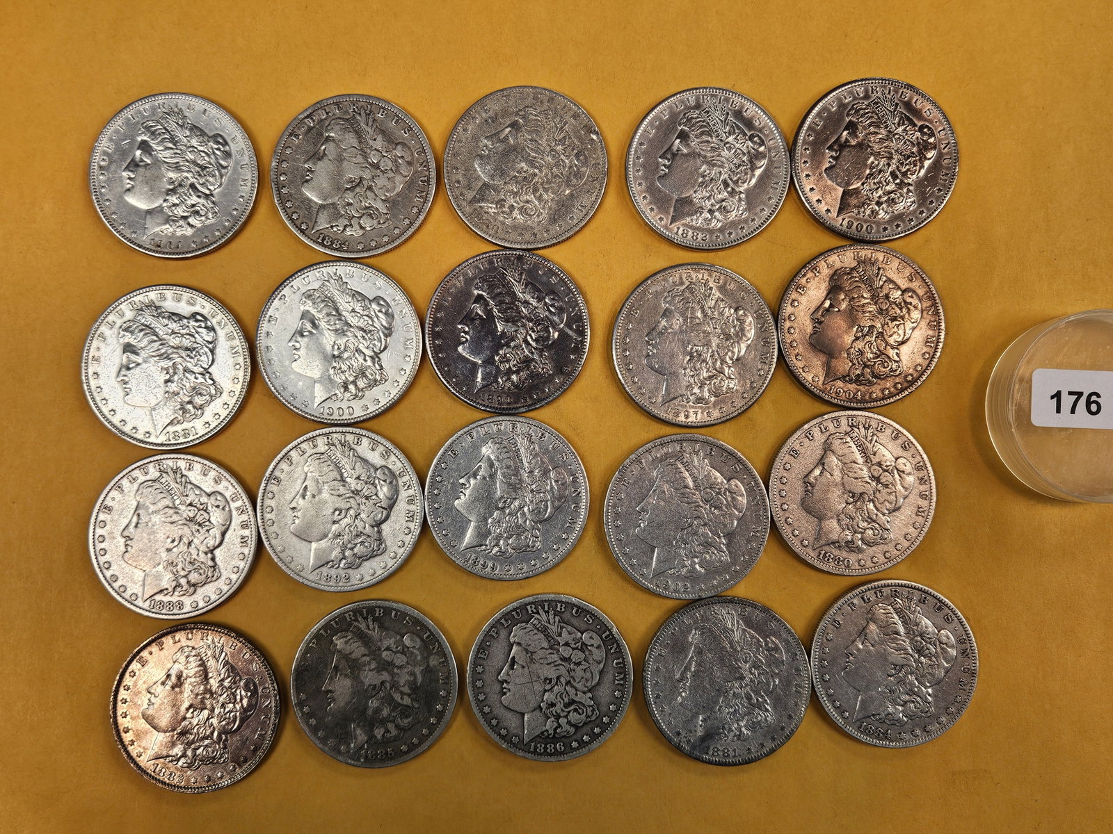 ** FULL ROLL ** Twenty Morgan Silver Dollars: All pre-1904. Grades from Very Good through Brilliant Uncirculated - details