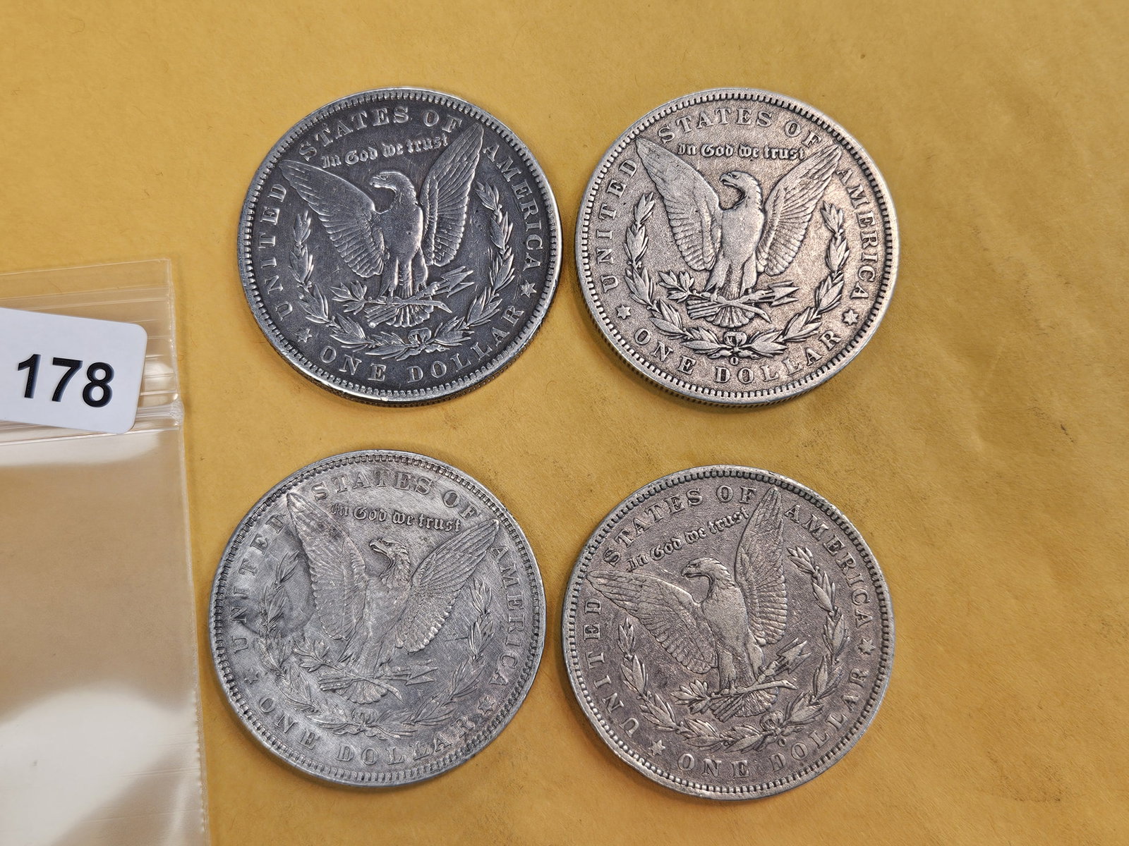 Four mixed Morgan silver Dollars - 2